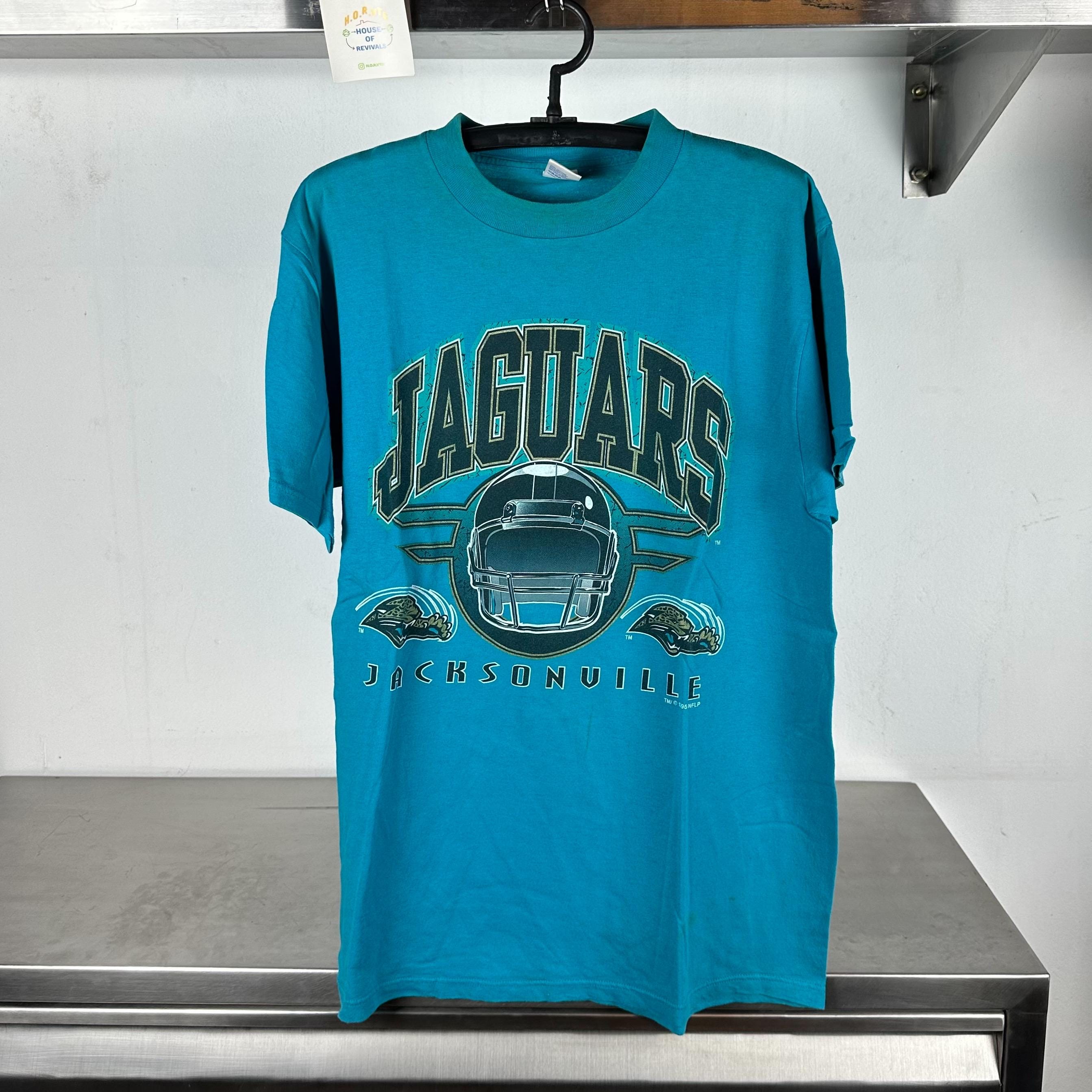 Vintage 1995 Jacksonville Jaguars NFL Logo 7 T shirt Vintage Jacksonville Jaguars Football Tshirts Sports Tshirts Jaguars Tees Graphic Tee – Everyday Comfort · Trending Graphic Apparel