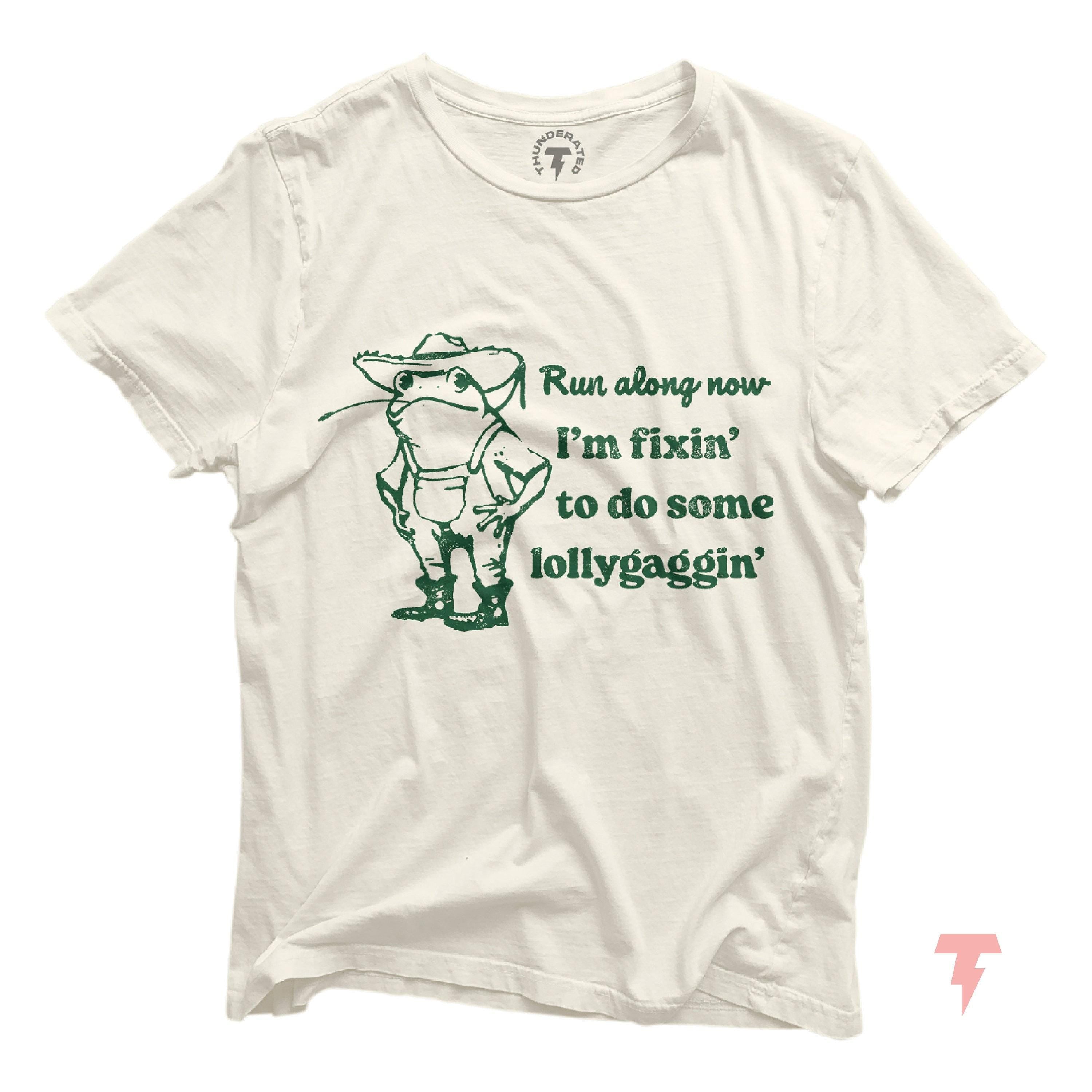 Vintage Southern Frog T Shirt quotRun Along Now I39m Fixing to Do Some Lollygagginquot Funny Country Design Cowboy shirt funny Cowgirl Graphic Tee – Bold Style · Top Pick For Any Outfit