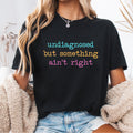 Undiagnosed But Something Aint Right shirt Undiagnosed But Im Pretty Sure Funny Mental Health Funny Sayings Shirt Trendy Top Graphic Tee – Soft Feel · Trending Graphic Apparel