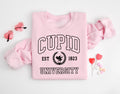 Cupid University Sweatshirt Cute Valentine39s Day Shirt Funny College Sweatshirt Trendy women39s shirt Cupid sweatshirt Trendy Sweatshirt Sweatshirt – Cozy Vibes · Trending Graphic Apparel