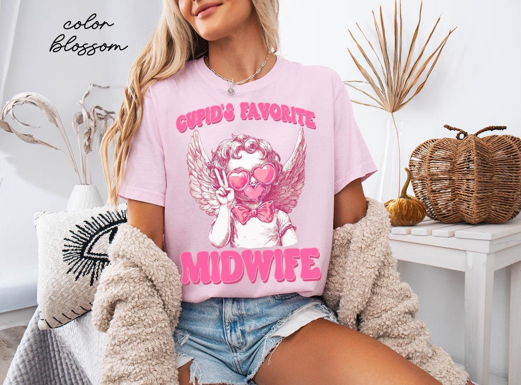 Midwife Valentine39s Day Shirt Midwife Valentine39s Day Gifts Cupid Tshirt Valentine39s Day Tee Women Graphic Tee – Premium Graphic · Great Gift For Fans