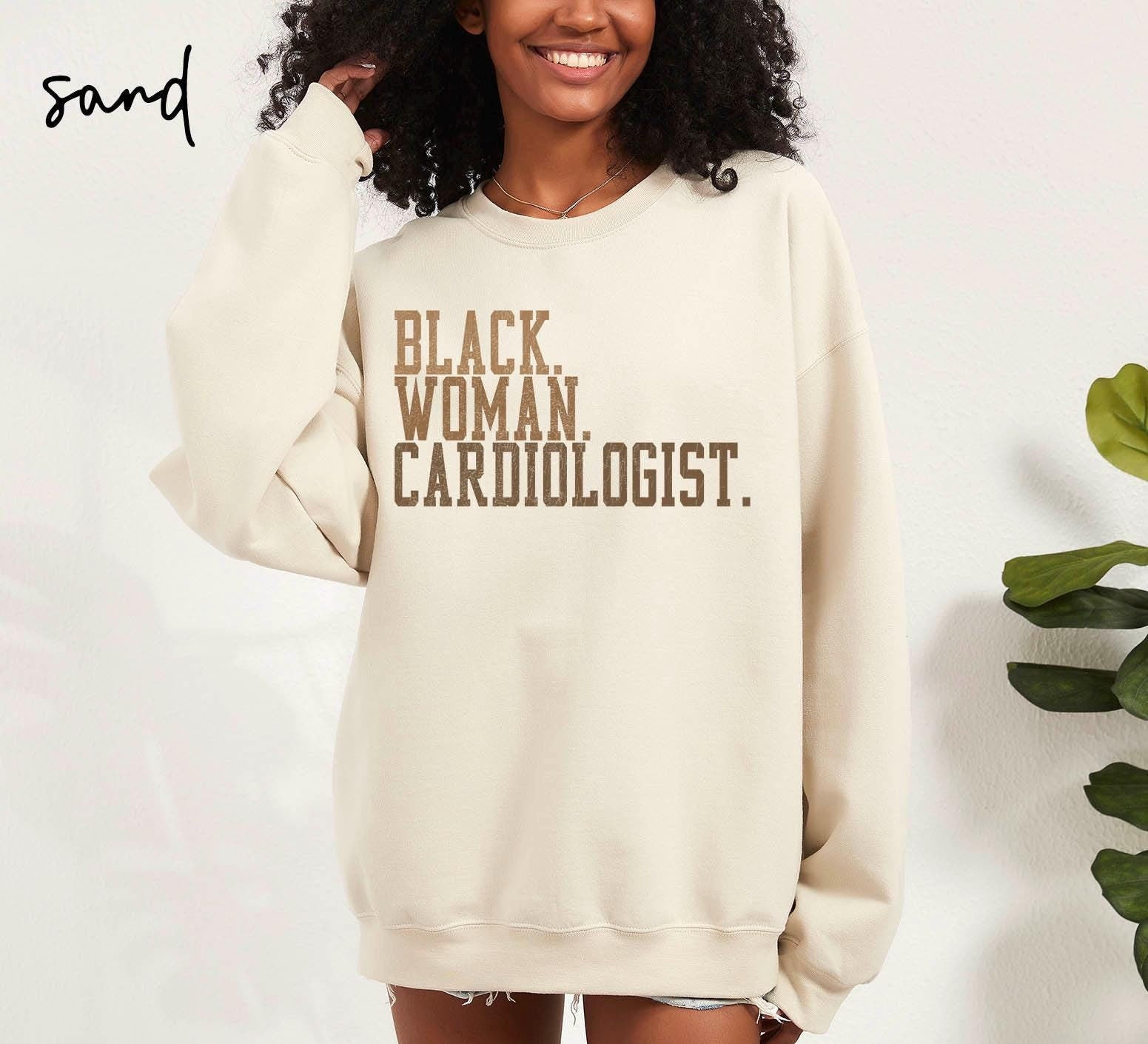 Black Cardiologist Sweatshirt Cardiology Gifts Graduation Gifts Black Woman Crewneck Shirt Black History Educated Black Woman Sweatshirt – Bold Style · High-Quality Print