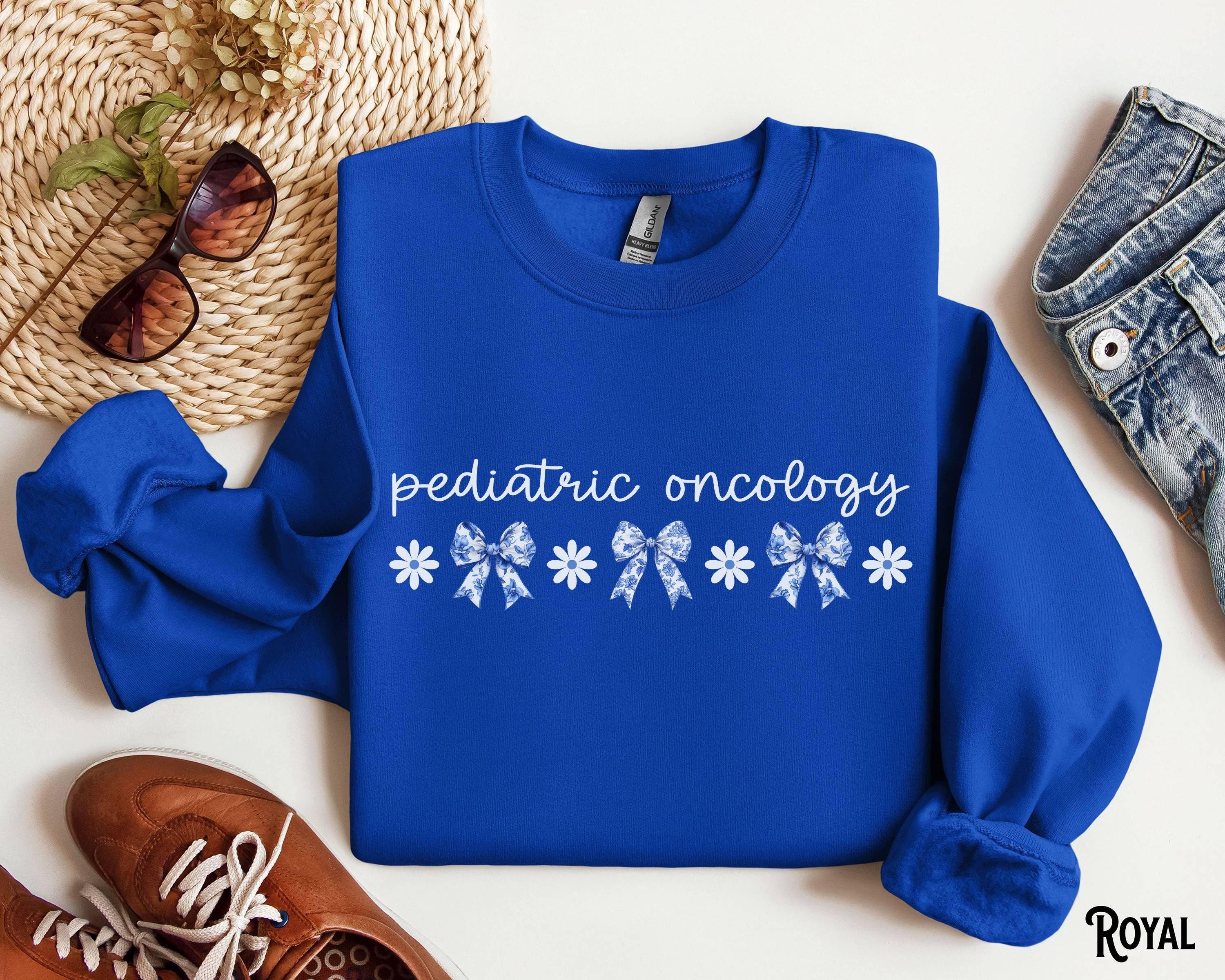 Pediatric Oncology Sweatshirt PEDS ONC Sweater Nurse Doctor Crew Coquette Bow RN Cancer Nurse Crewneck Hematology Nursing Gift Sweatshirt – Cozy Vibes · High-Quality Print