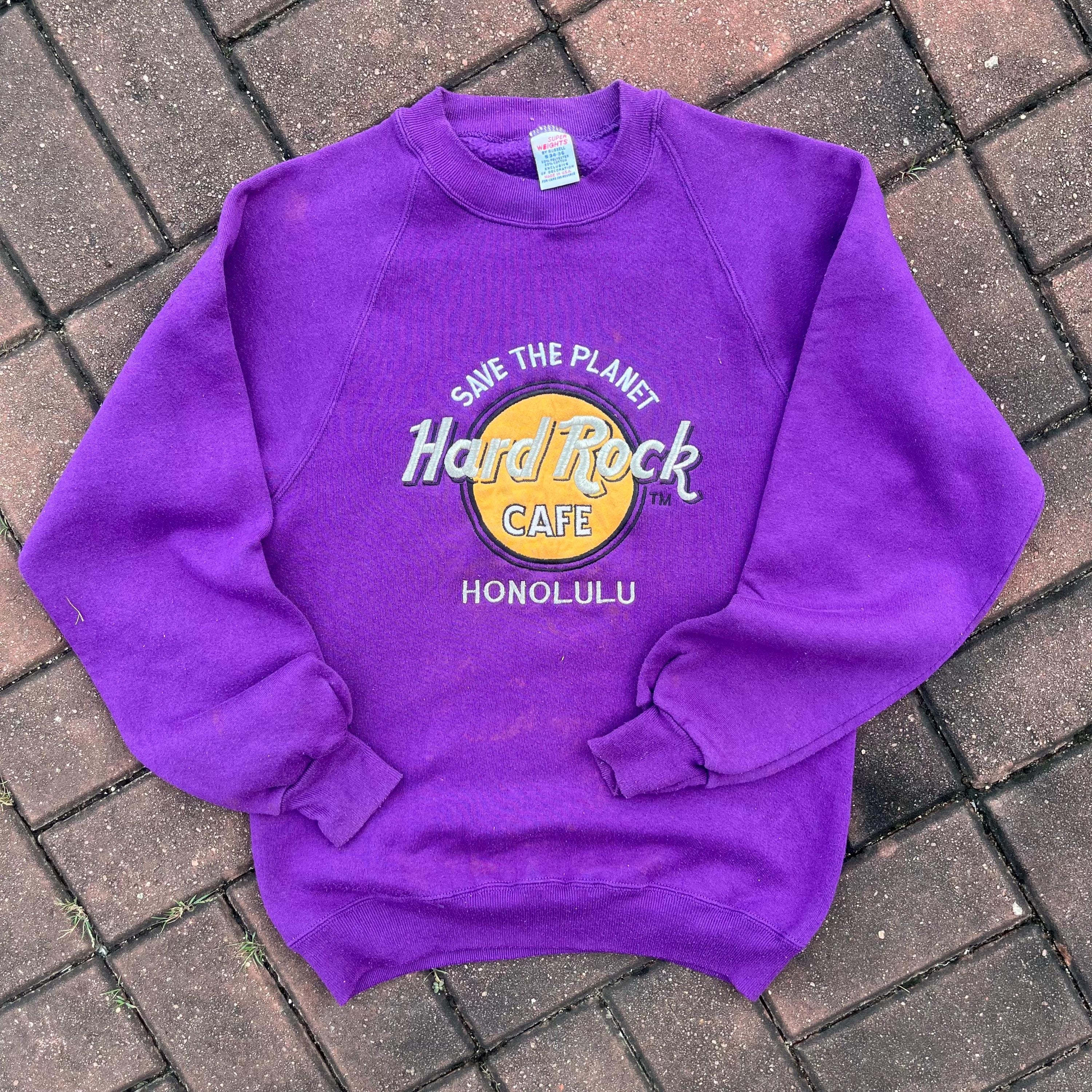 Vintage 90s Russell Tag Hard Rock Honolulu Spellout Big Logo Embroidered Sweater Crewneck Pullover Sweater Hard Rock Colour Purple Size S Graphic Tee – Feel-Good Design · Must-Have Style