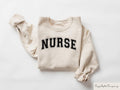 Trendy Nurse Sweatshirt Cute Nursing T shirt Registered Nurse Shirt Retro Nurse Hoodie Nursing School Tee Gift For Medical Student Hoodie – Aesthetic Look · Must-Have Style