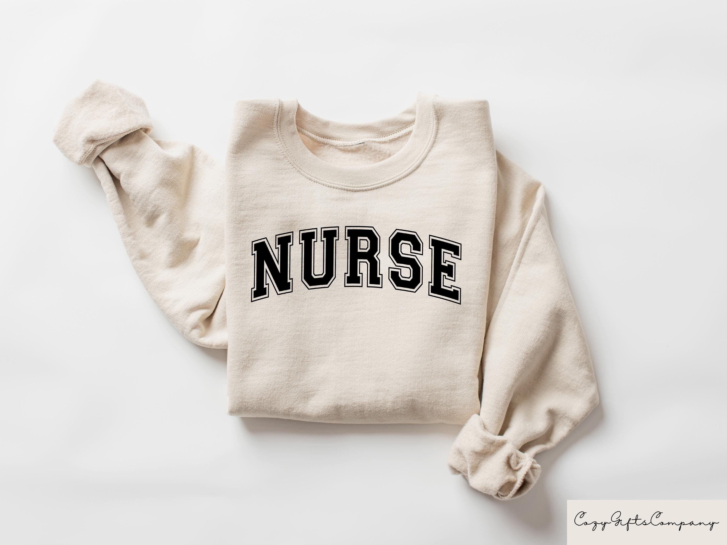 Trendy Nurse Sweatshirt Cute Nursing T shirt Registered Nurse Shirt Retro Nurse Hoodie Nursing School Tee Gift For Medical Student Hoodie – Aesthetic Look · Must-Have Style