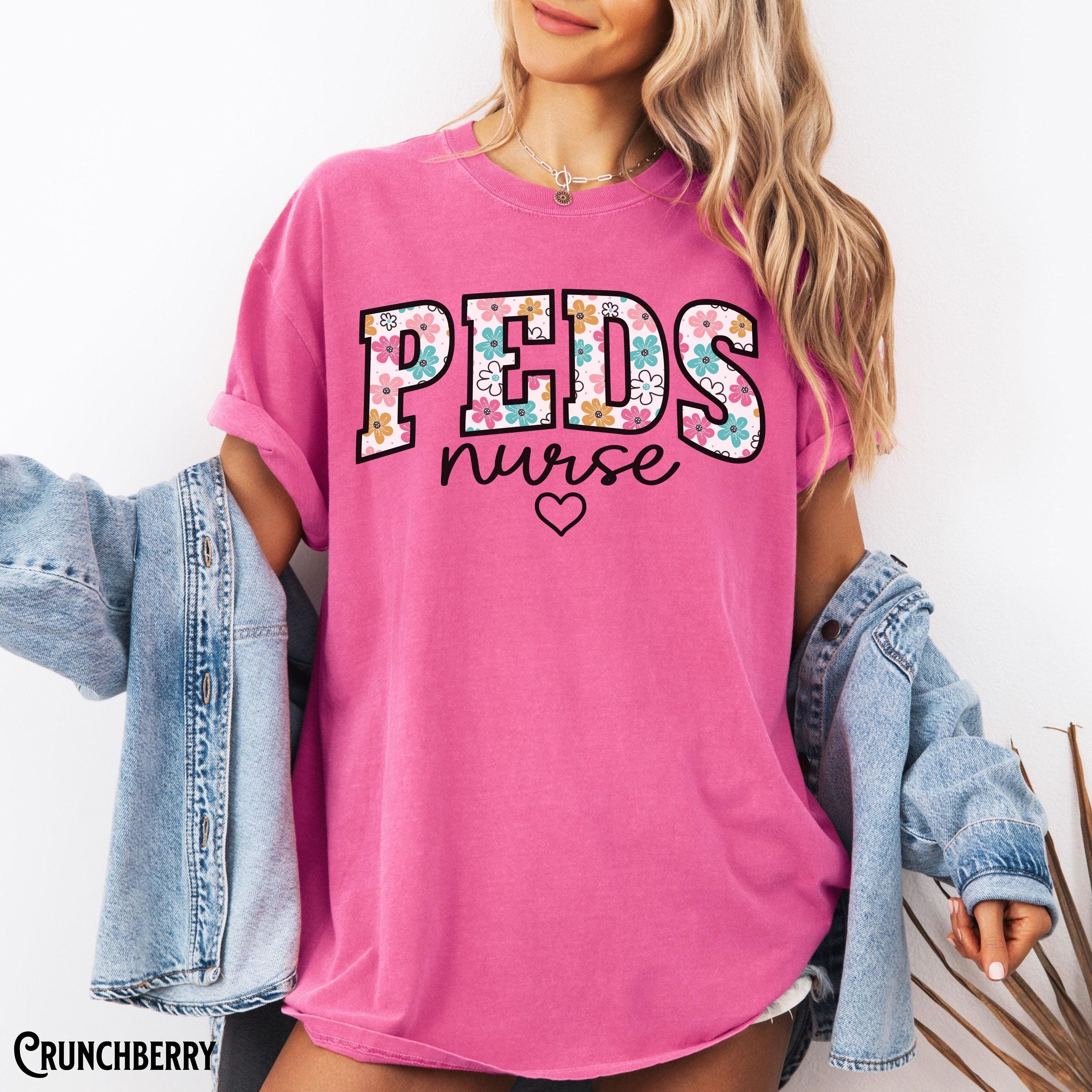 Pediatric Nurse Shirt PEDS Nurse Tee Retro Flowers Pediatrics Varsity Tshirt PEDS RN Pediatric Nursing Floral Gift Graphic Tee – Aesthetic Look · Perfect For Daily Wear