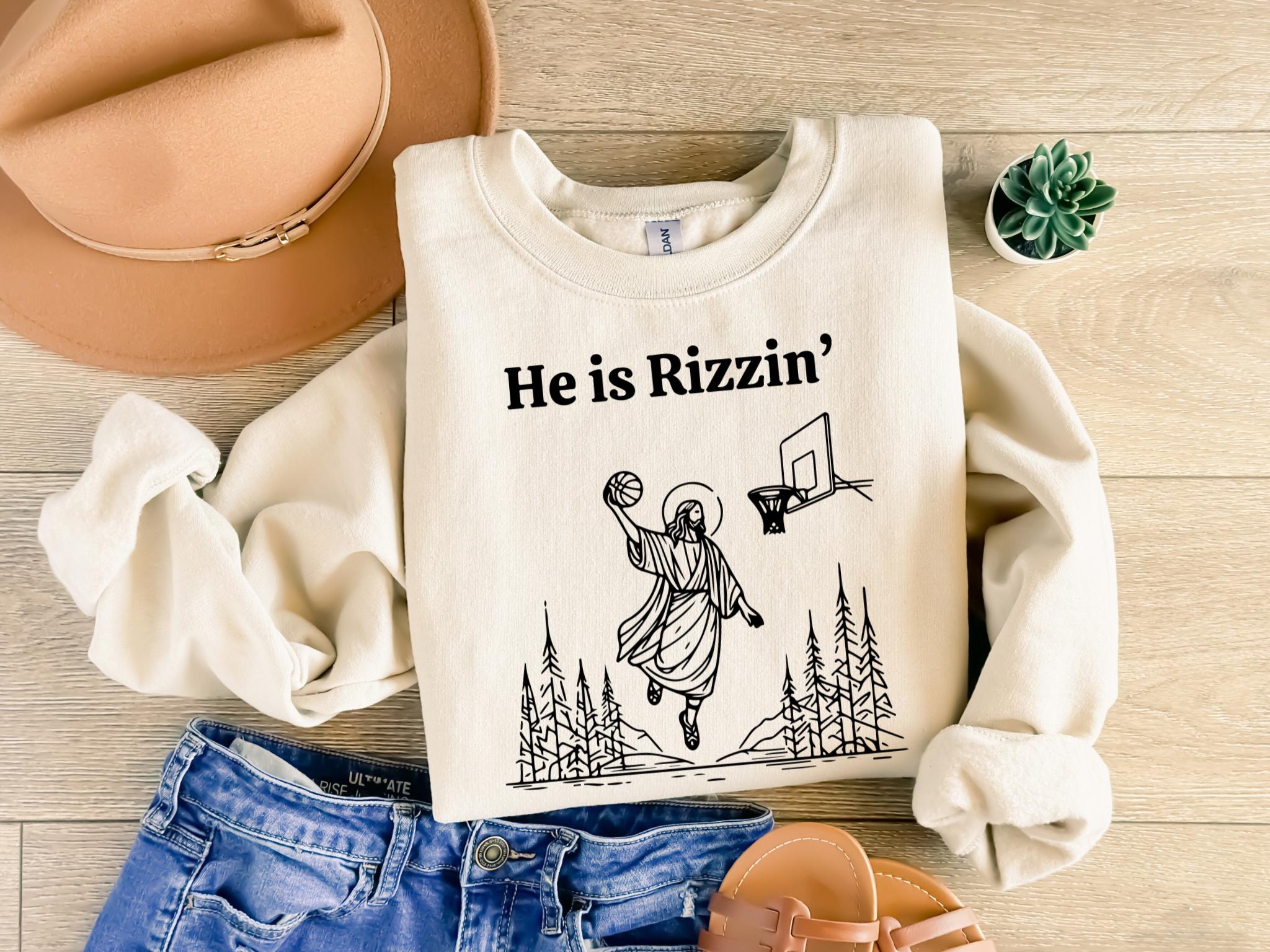 He Is Rizzin39 Sweatshir He Is Rizzin39 Basketball Sweatshirt and ShirtFunny Easter Day ShirFunny Jesus ShirtEaster GiftTrendy Sweatshirt Sweatshirt – Aesthetic Look · Trending Graphic Apparel