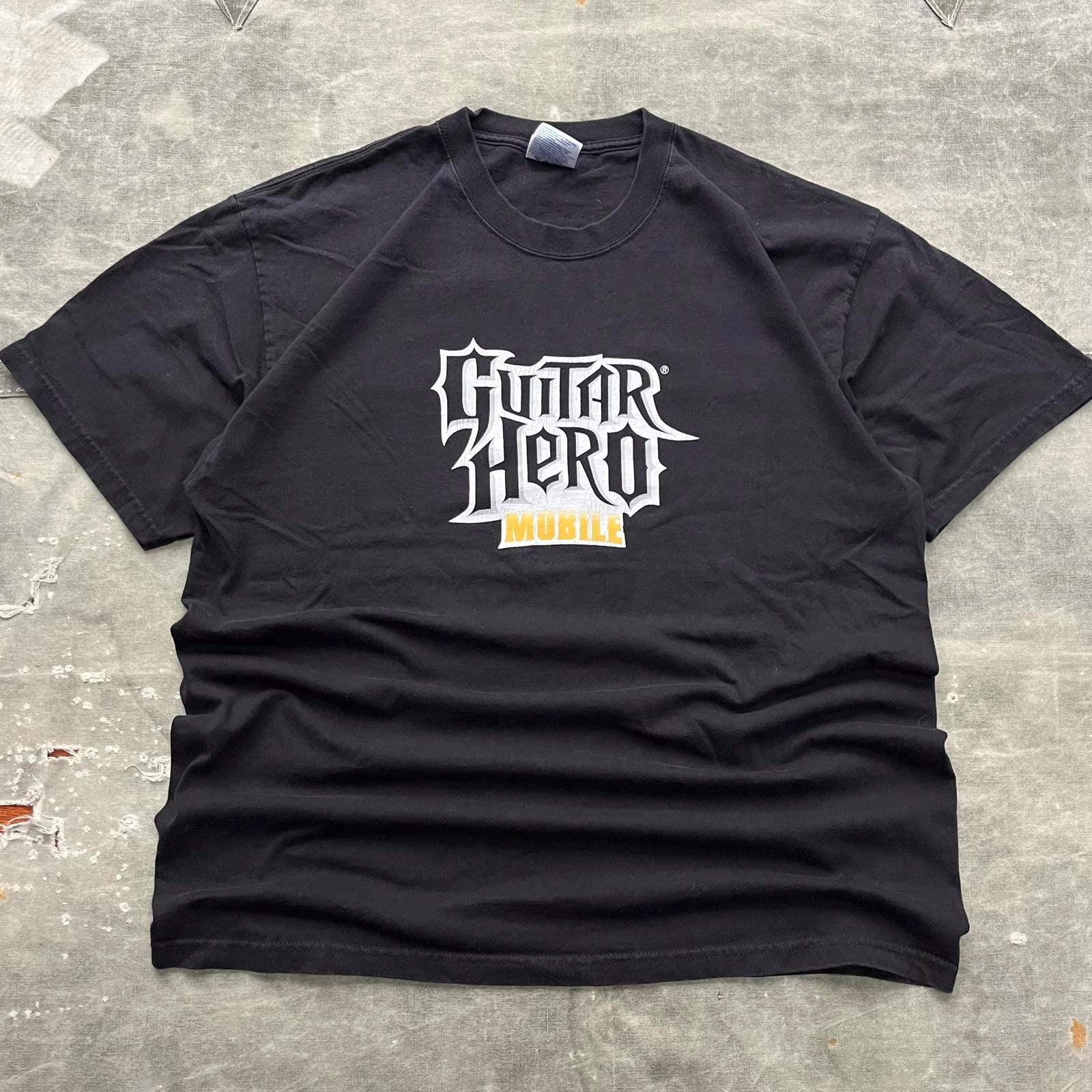 Vintage Y2K Guitar Hero Xbox PlayStation Video Game Shirt Graphic Tee – Aesthetic Look · Trending Graphic Apparel