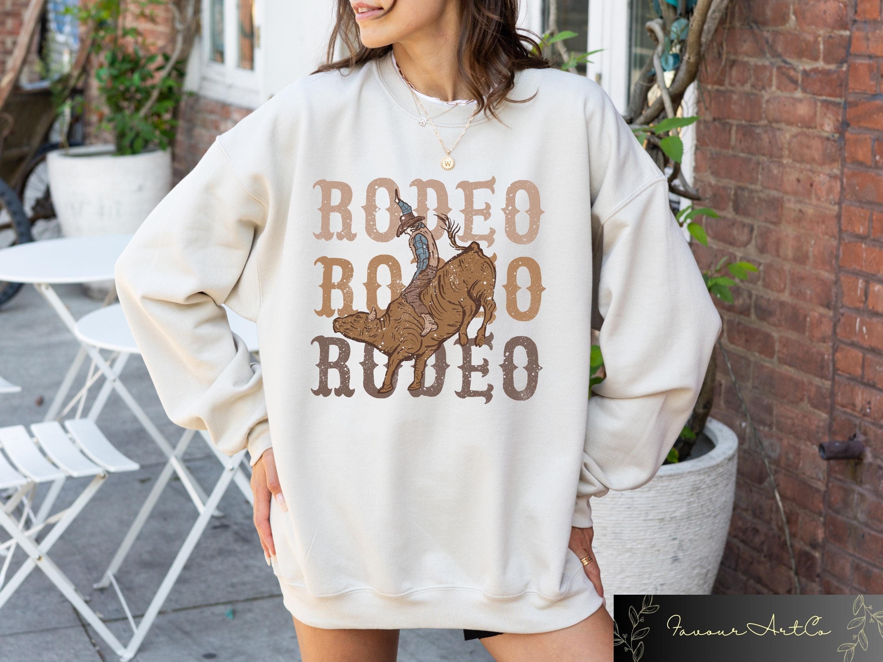 Rodeo Cowboy Sweatshirt Country Women T shirt Retro Western Shirt Rodeo Cowboy Hoodie Howdy Western Rodeo Tee Cute Cowgirl Gift Hoodie – Bold Style · Top Pick For Any Outfit