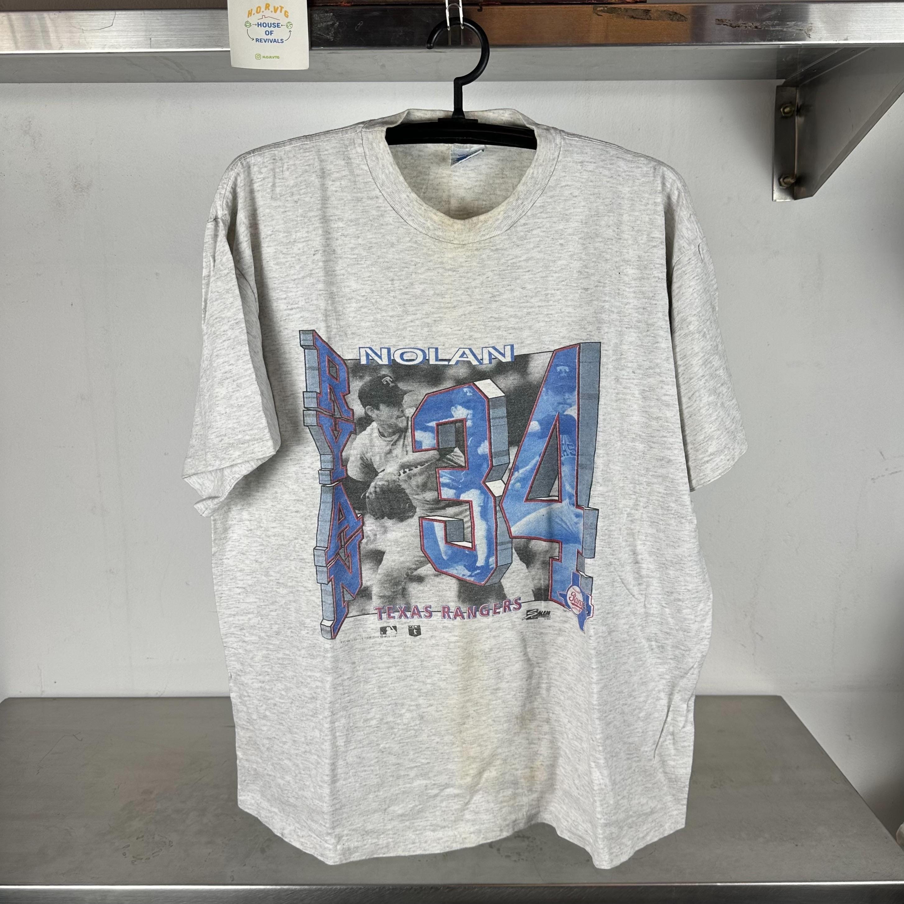 Vintage 1991 Nolan Ryan Texas Rangers Baseball MLB single stitch T shirt Vintage Texas Rangers Tshirts Vintage Nolan Ryan Tshirts Graphic Tee – Easygoing Wear · Trending Graphic Apparel