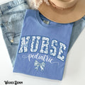 Pediatric Nurse Shirt PEDS Nurse Pediatric RN PICU Blue Floral Chinoiserie Varsity Tee Bow Gift for Pediatric Nurse Graphic Tee – Premium Graphic · High-Quality Print