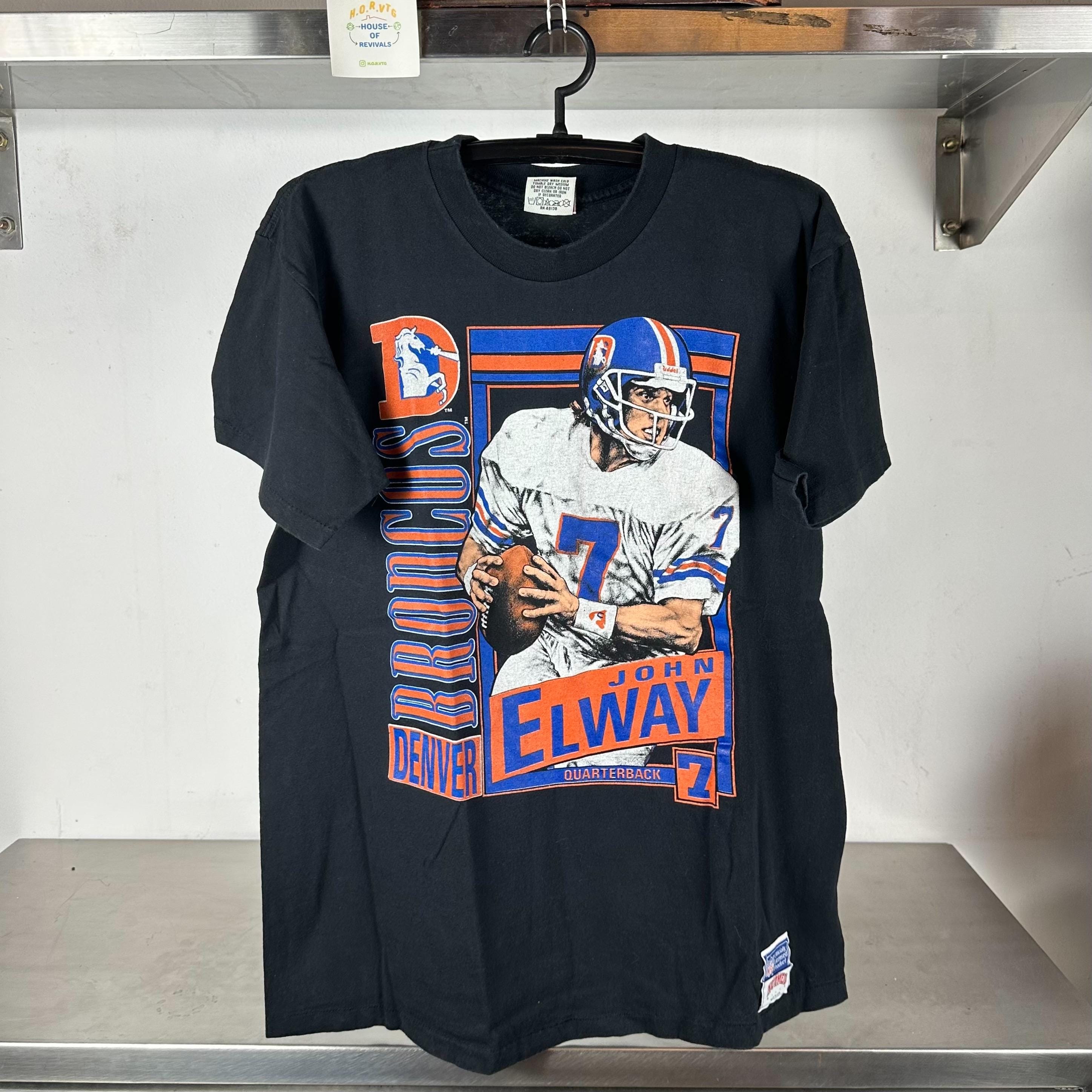 Vintage John Elway Denver Broncos NFL Nutmeg XL single stitch T shirt Vintage NFL Tshirts Vintage Sports Tshirts Denver Broncos Tshirt Graphic Tee – Premium Graphic · Trending Graphic Apparel