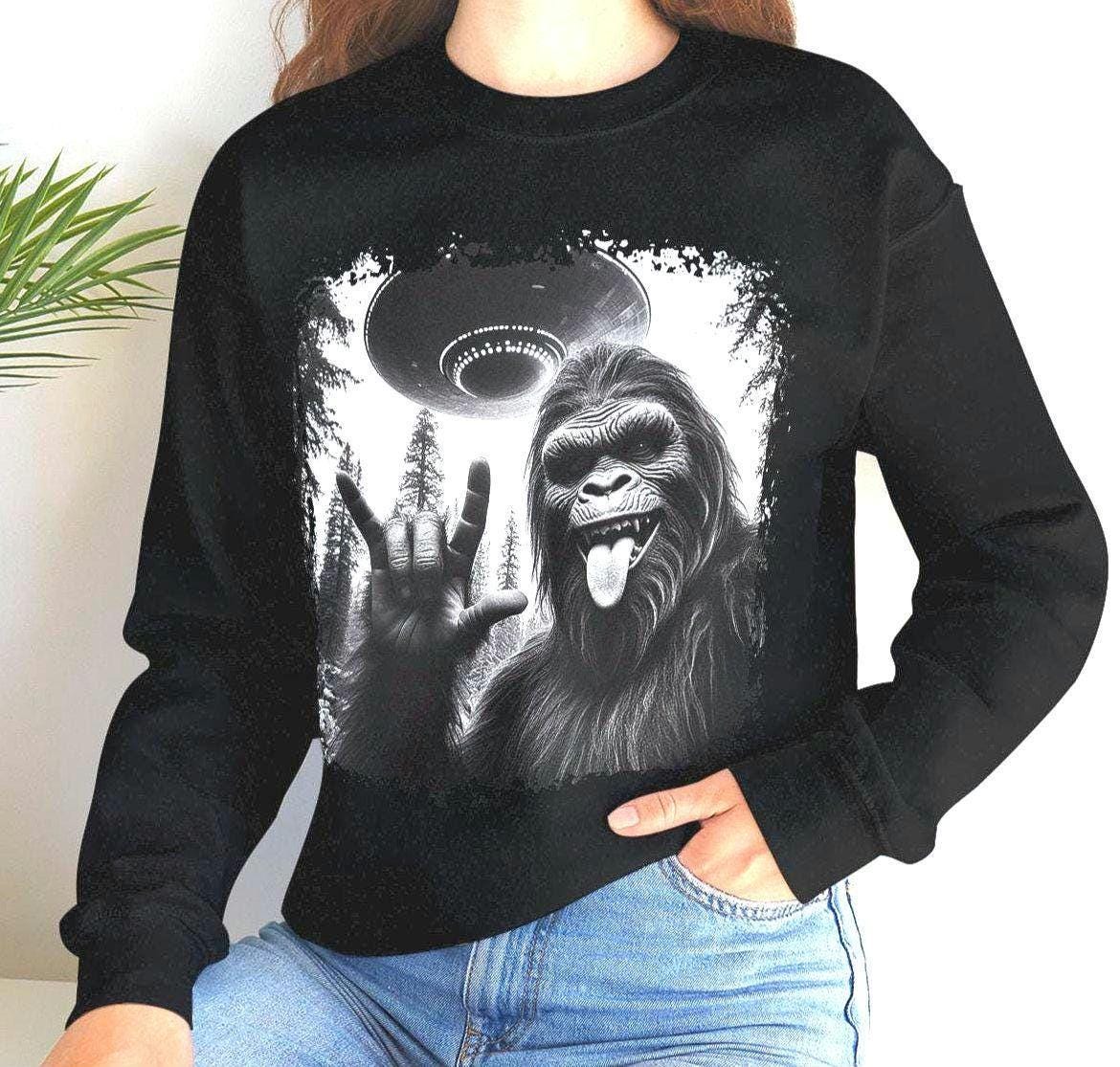 Bigfoot Sasquatch UFO Sweatshirt Alien Abduction Tee Cryptozoology Apparel Funny Yeti Tee Mythical Creature Clothing Funny Novelty Gift Sweatshirt – Feel-Good Design · Perfect For Daily Wear