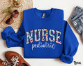 Pediatric Nurse Sweatshirt PEDS Sweater Pediatrics Nurse Floral Crewneck RN Flower Fleece PEDS Varsity Sweatshirt Pediatric Nurse Gift Sweatshirt – Premium Graphic · Must-Have Style