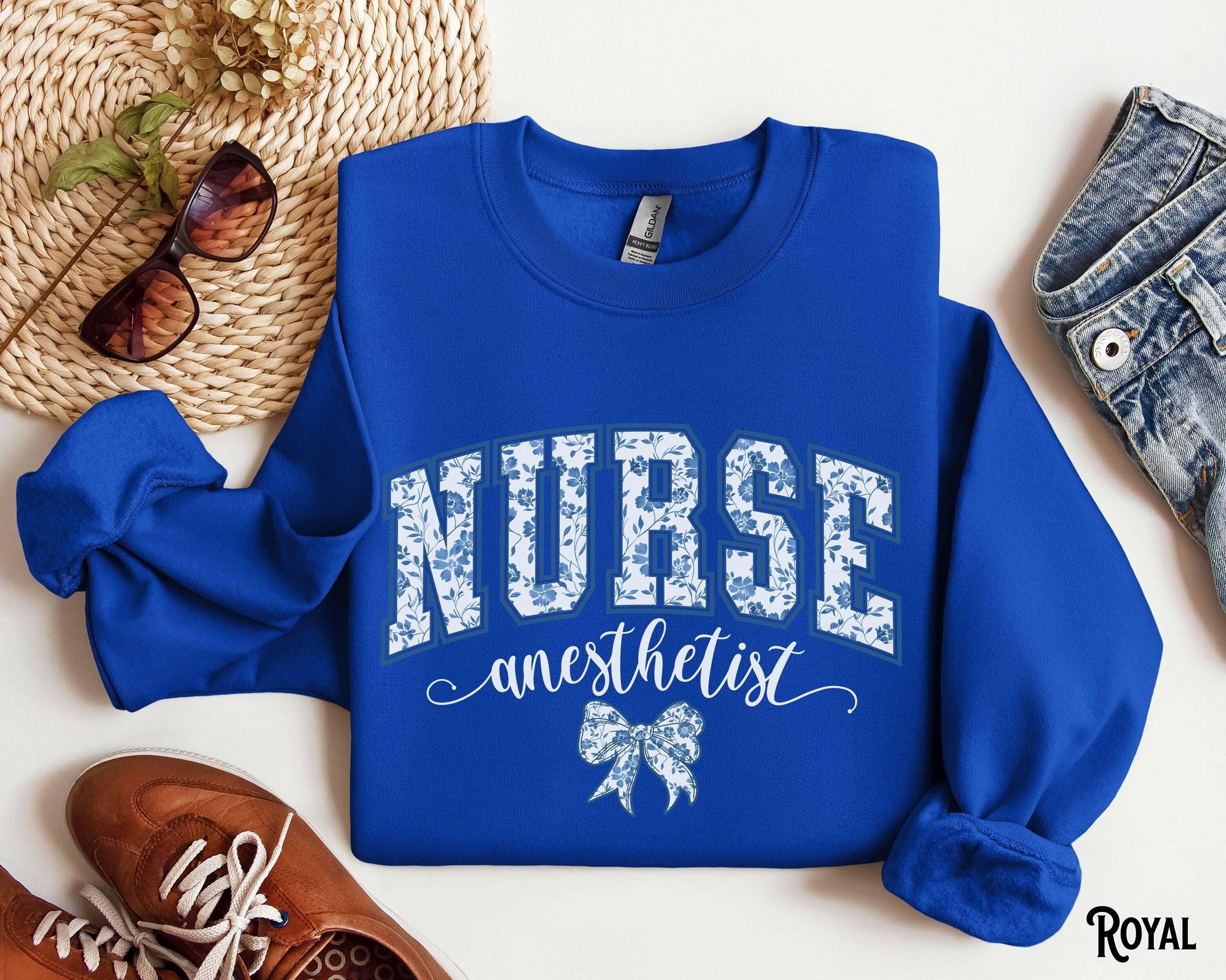 Nurse Anesthetist Sweatshirt CRNA Varsity Sweater Anesthesiology RN Anesthesia Crewneck ICU Bow Chinoiserie Blue Floral Nursing Gift Sweatshirt – Feel-Good Design · Great Gift For Fans