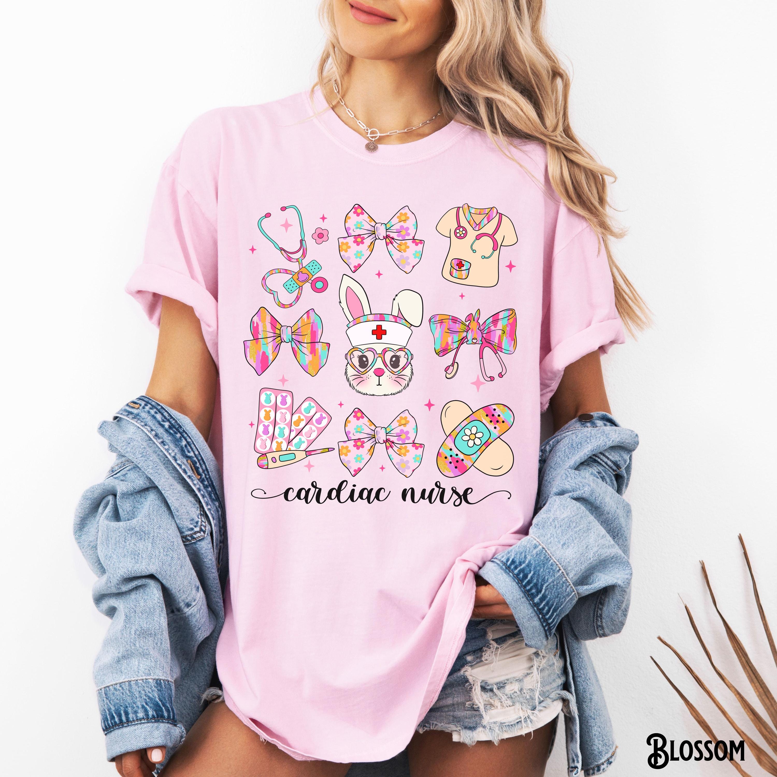 Cardiac Nurse Easter Shirt Cardiology Easter Bow Tee Vascular Heart Nurse RN LPN CVICU Bunnies Cardiac Nurse Gift Graphic Tee – Bold Style · High-Quality Print