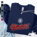 Steminist Sweatshirt Unisex STEM Feminist Apparel Perfect for Science Enthusiasts Ideal Gift for STEM Student Sweatshirt – Fan Favorite · Trending Graphic Apparel