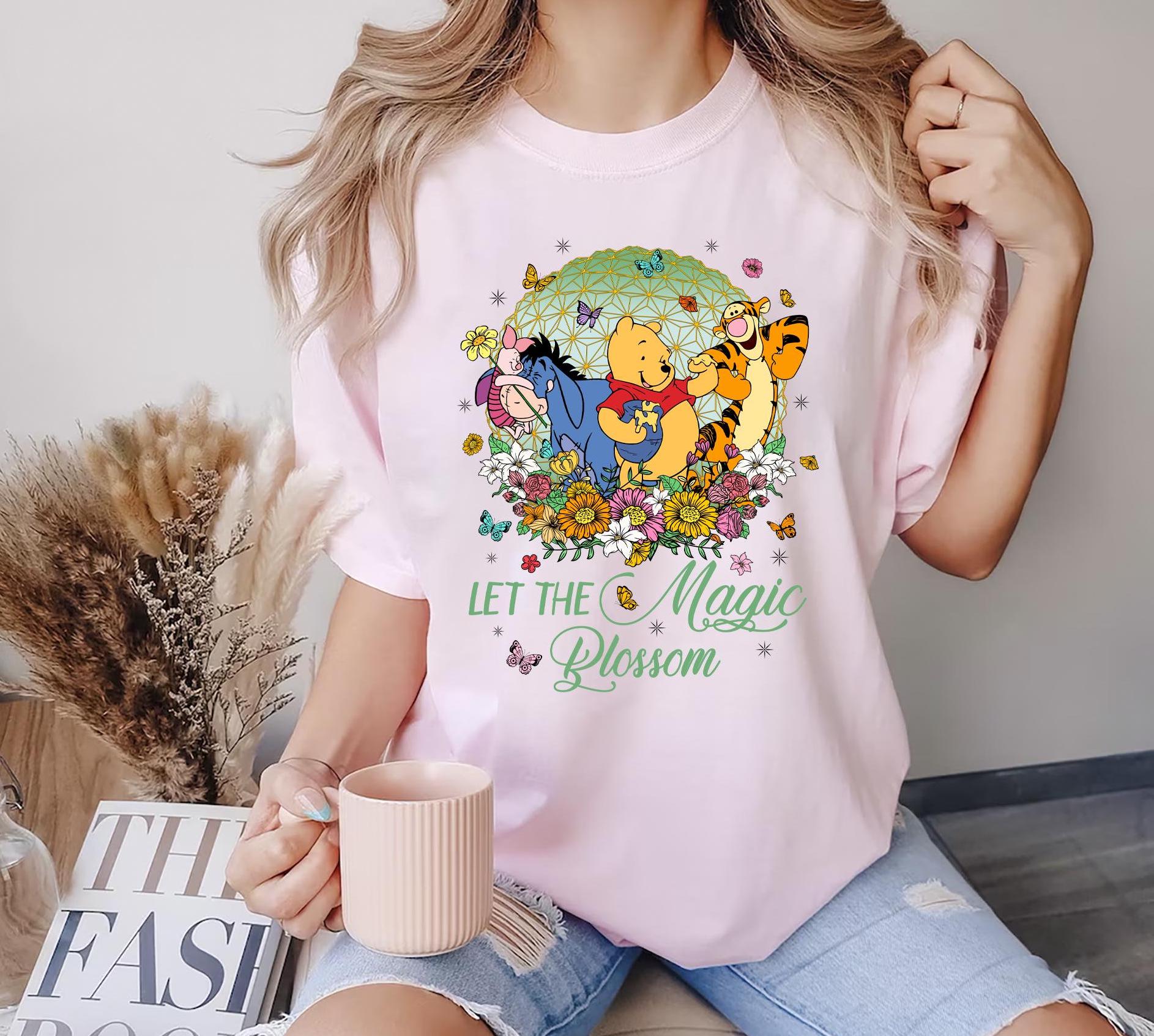 Winnie The Pooh Let The Magic Blossom Shirt Winnie The Pooh Floral Tee Disney Epcot Flower Garden Festival Shirt Disney Family Trip Shirt Graphic Tee – Soft Feel · Top Pick For Any Outfit