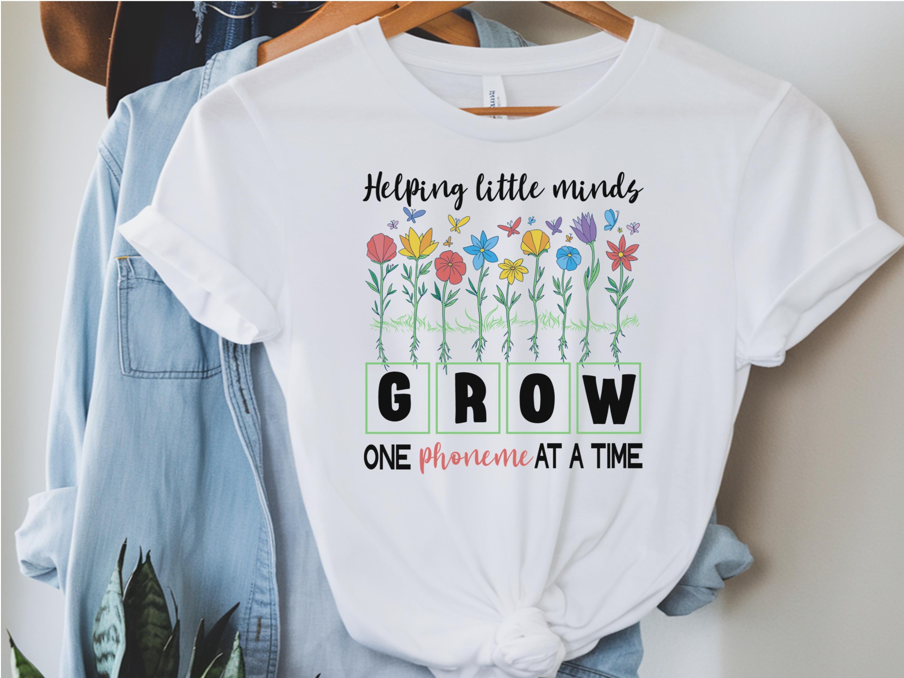 Helping Little Minds Grow Shirt Literacy Coach Shirt Literacy Specialist Shirt Literacy Coach Teacher Shirt Read Librarian Shirt Graphic Tee – Fan Favorite · Trending Graphic Apparel