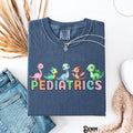 Pediatrics Shirt PEDS Nurse Dino Tee Dinosaur Pediatrics RN Pediatric Doctor Tshirt PICU Tee Gift for Pediatric Nurse Graphic Tee – Soft Feel · Trending Graphic Apparel
