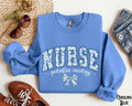 Pediatric Oncology Sweatshirt PEDS ONC Varsity Sweater Nurse Crew Coquette Bow RN Cancer Nurse Crewneck Hematology Nursing Gift Sweatshirt – Warm & Stylish · Great Gift For Fans
