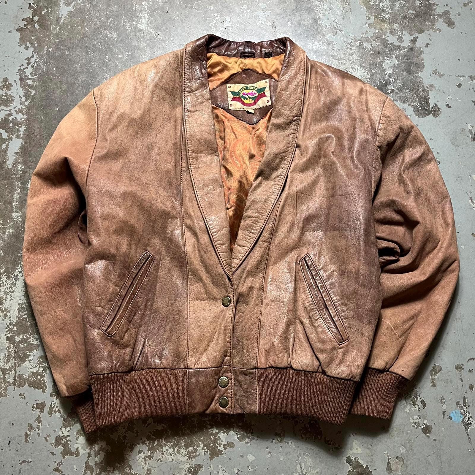 Vintage Unisex 90s Rock Creek Chocolate Brown Leather Jacket Graphic Tee – Easygoing Wear · Top Pick For Any Outfit