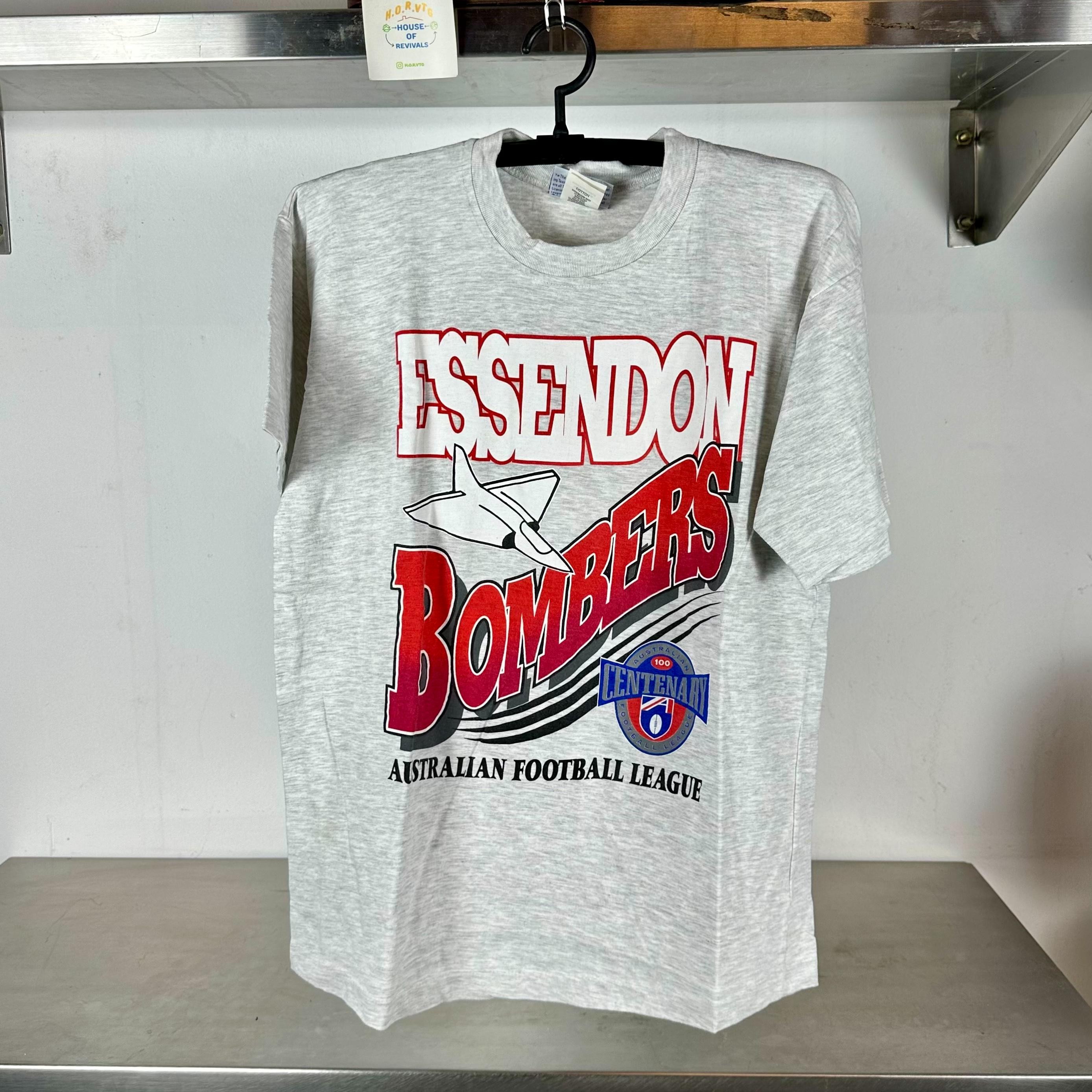 Vintage 90s Essendon Bombers Australian Football League AFL single stitch T shirt Vintage AFL Tees Vintage Australian Football Tshirts Graphic Tee – Aesthetic Look · Perfect For Daily Wear