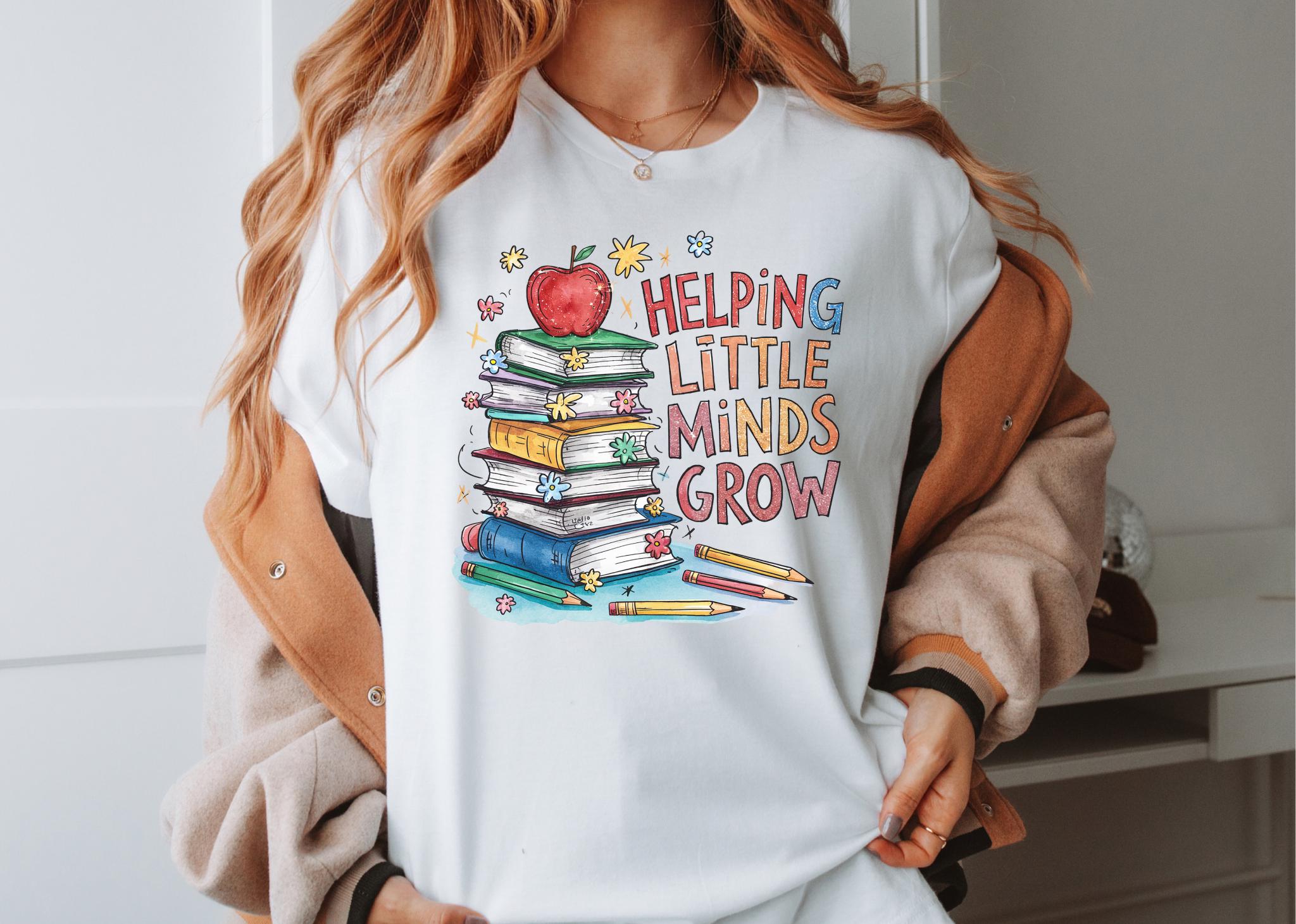 Teacher t shirt Helping Little Minds Grow Shirt Teacher Shirt Cute Shirt for TeachersWildflowers shirtTeacher Flower ShirtWomens shirt Graphic Tee – Fan Favorite · Great Gift For Fans