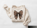 Coquette Bow Sweatshirt Leopard Coquette T shirt Aesthetic Bow Shirt Trendy Mom Gift Aesthetic Coquette Crewneck Leopard Women Tee Sweatshirt – Bold Style · Trending Graphic Apparel