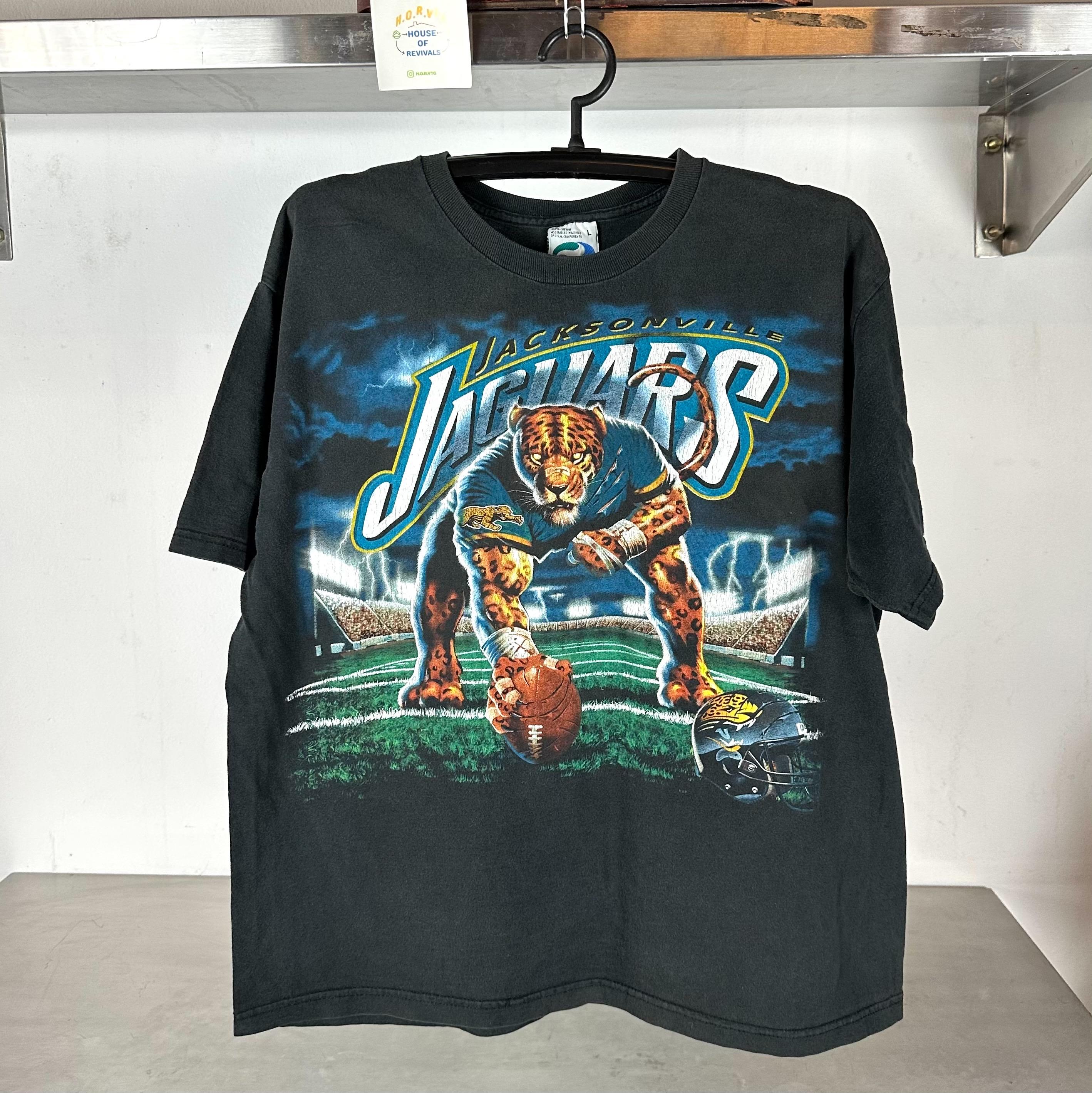 Vintage 90s Jacksonville Jaguars Football Liquid Blue Graphic NFL Large T shirt Jacksonville Jaguars Tshirt Football Tshirt Sports Tshirt Graphic Tee – Premium Graphic · Great Gift For Fans