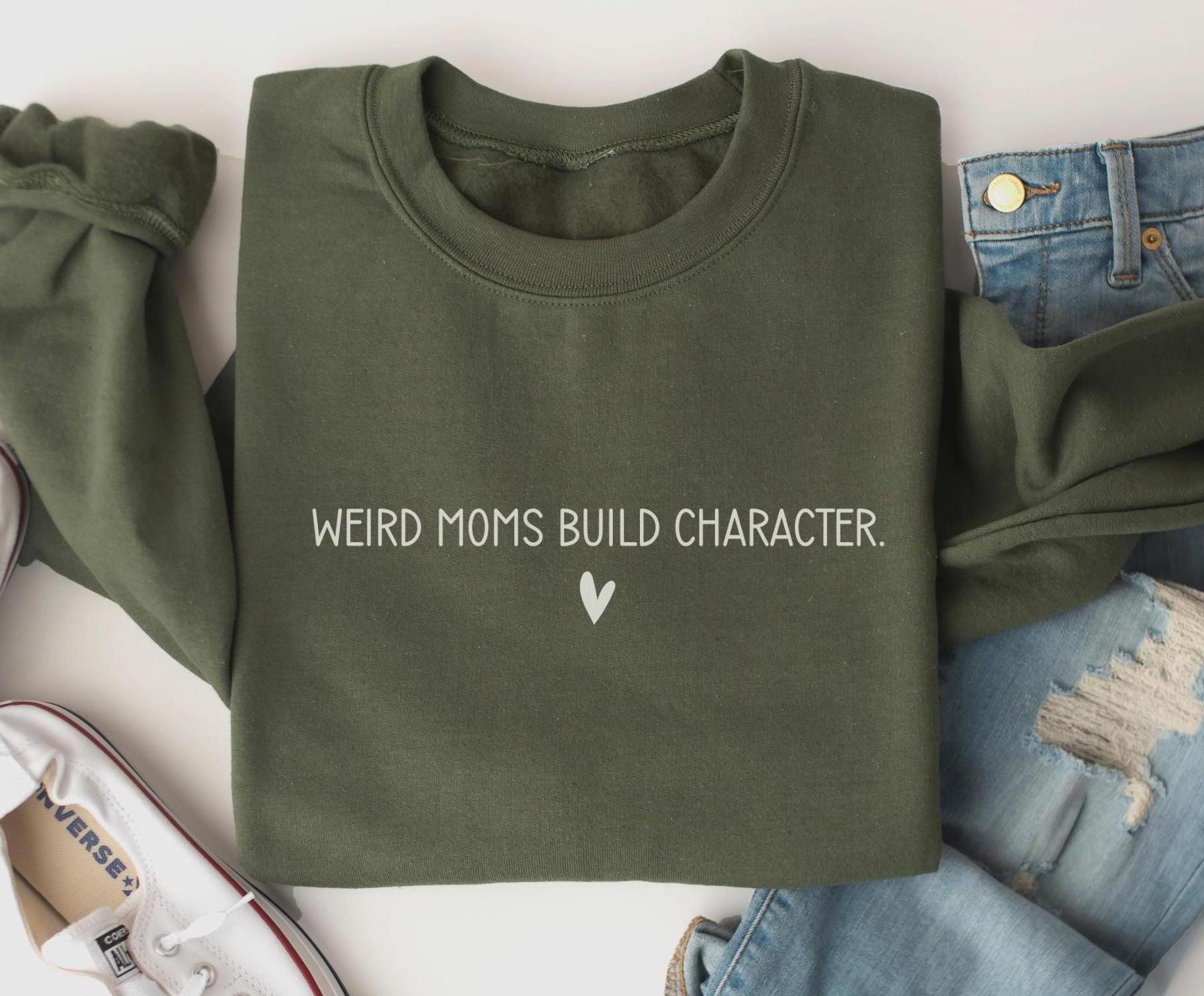 Funny MOM Sweatshirt Weird Moms Build Character Shirt Perfect Embarrassing Mom Gift for Mother39s Day Sweatshirt – Everyday Comfort · High-Quality Print