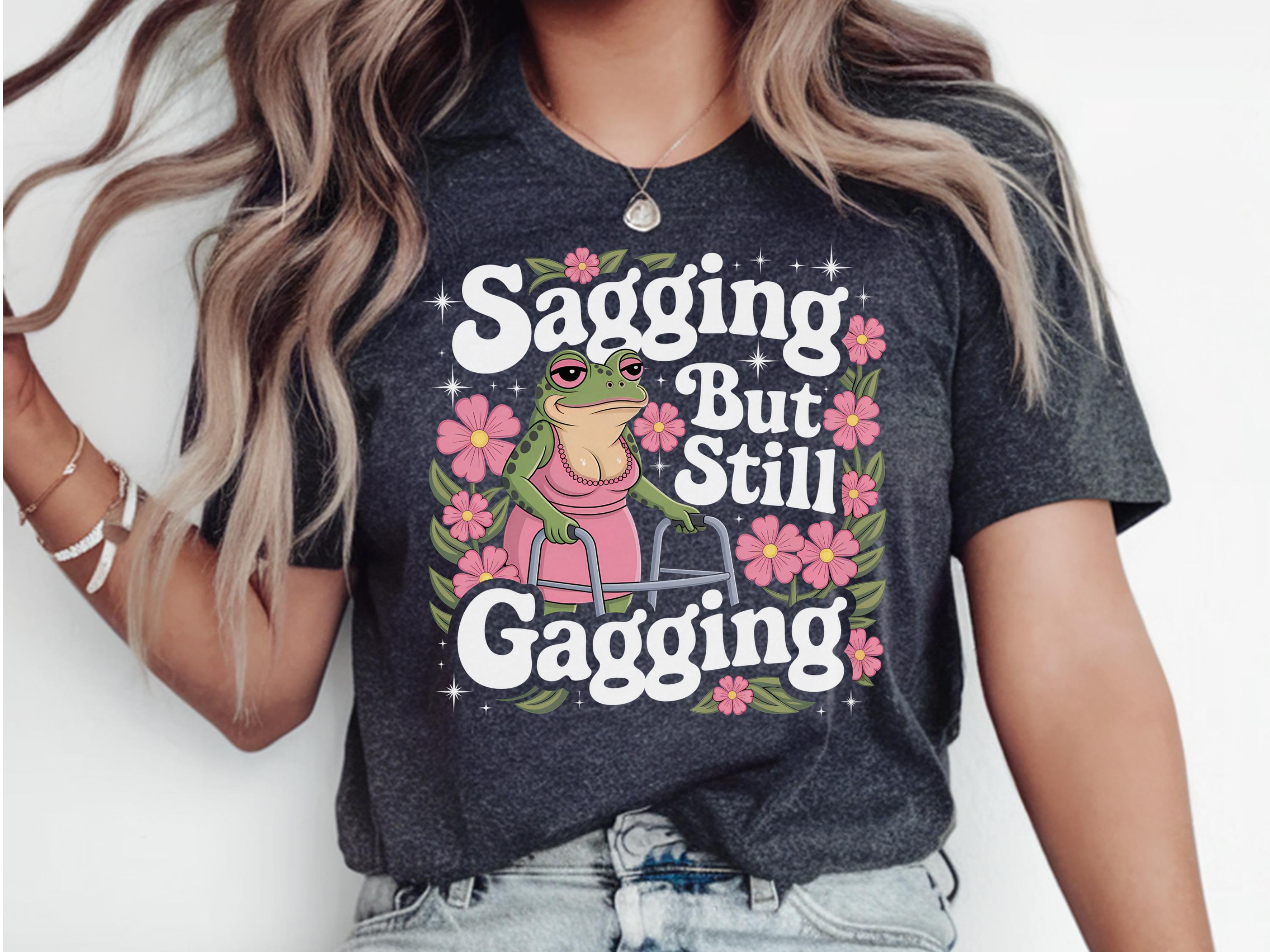 Sagging But Still Gagging Shirt Funny Frog Meme Shirt Inappropriate Shirt Funny Meme Shirt Offensive Mom Gift Funny Gifted Grandma Graphic Tee – Soft Feel · Top Pick For Any Outfit