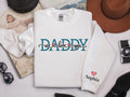 Personalized Daddy Sweatshirt With Kids Names On Sleeve Personalized sweatshirt Gift for Dad Father39s Day or Dad gift Dad Sweatshirt Sweatshirt – Aesthetic Look · Trending Graphic Apparel