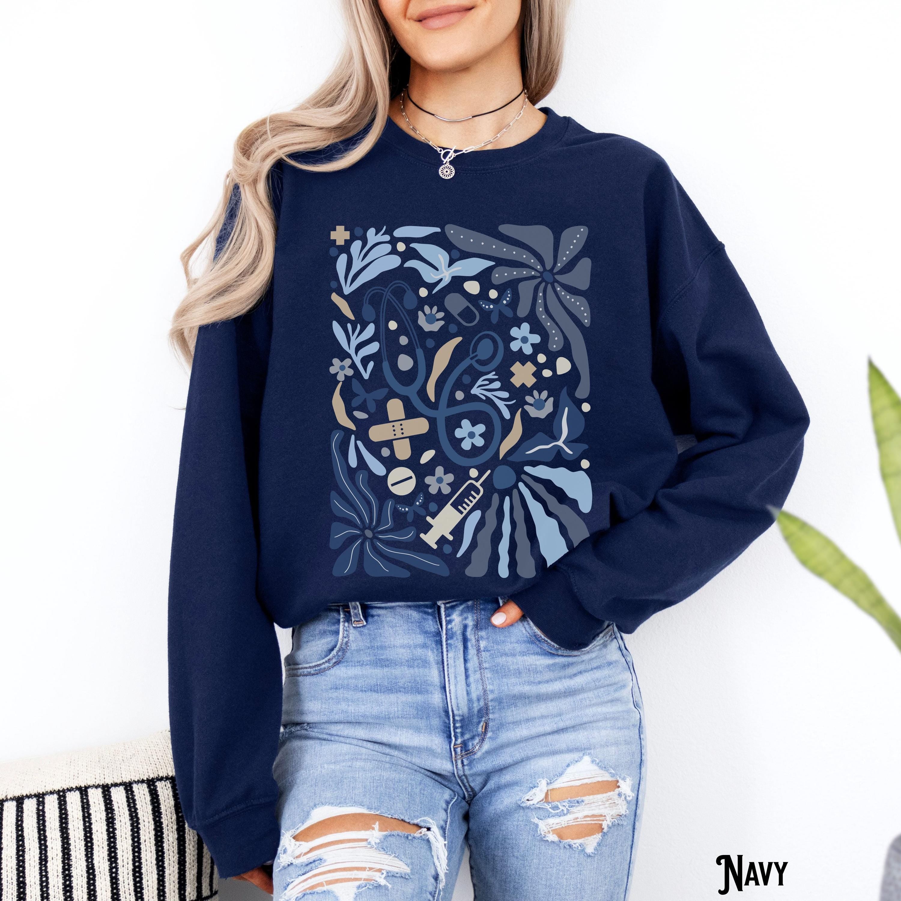 Floral Nurse Sweatshirt Boho Botanical Sweater Blue Flowers Wildflower Retro Fleece Vintage Stethoscope RN Registered Nurse Gift Sweatshirt – Feel-Good Design · High-Quality Print