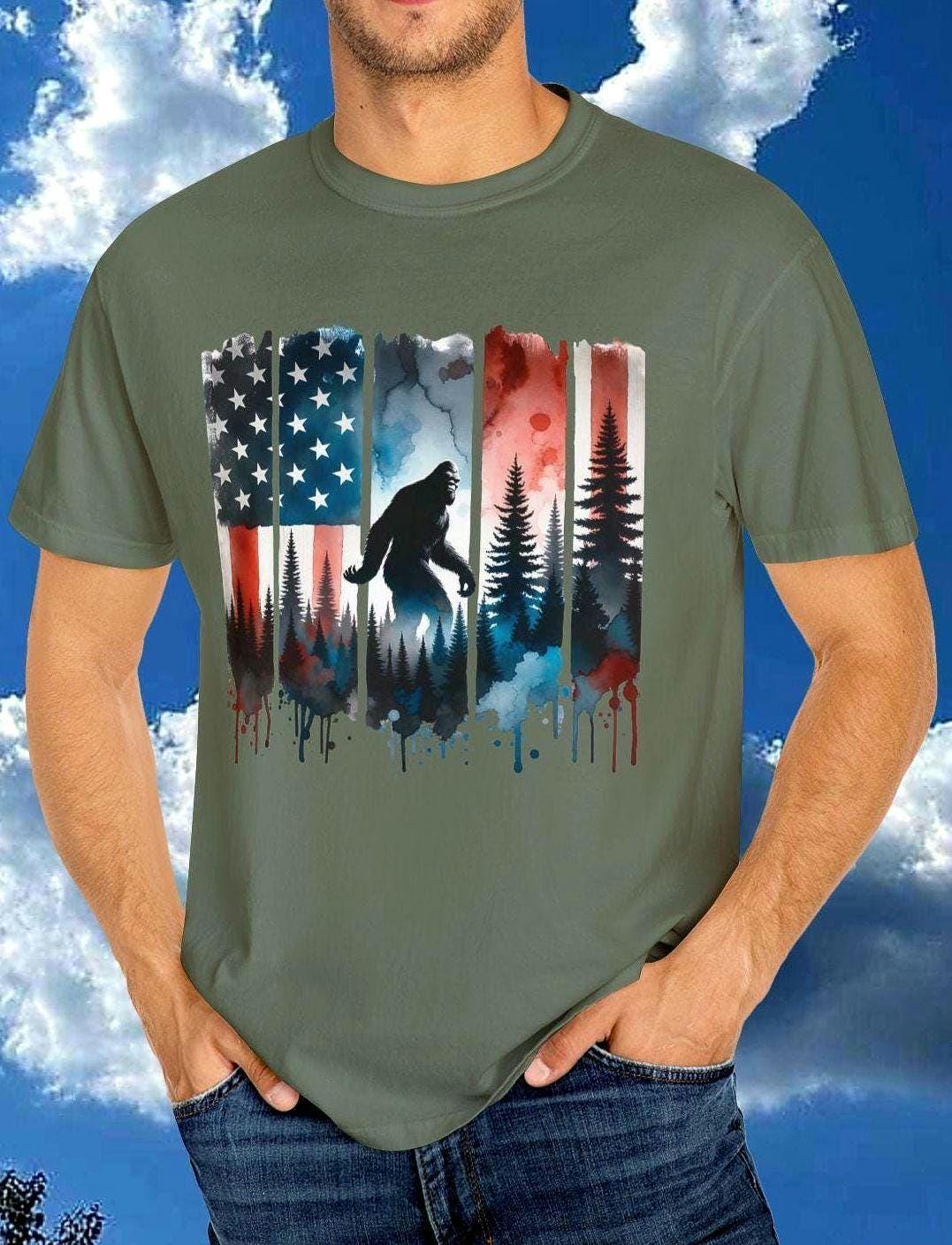 Bigfoot Patriotic Unisex T shirt Tee for Outdoorsy Enthusiasts Sasquatch Lover Gift Fourth of July Shirt Crytip Shirt Graphic Tee – Warm & Stylish · High-Quality Print