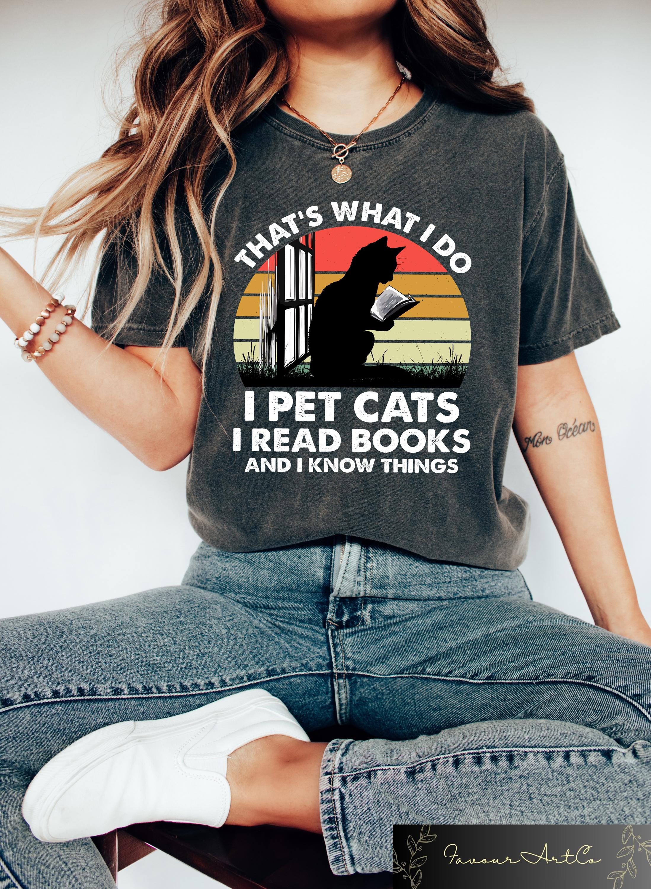 Cats And Books T shirt Reader Cat Shirt That39s What I Do I Pet Cats I Read Books And I Know Things Sweatshirt Bookworm Cat Owner Gift Sweatshirt – Fan Favorite · Trending Graphic Apparel