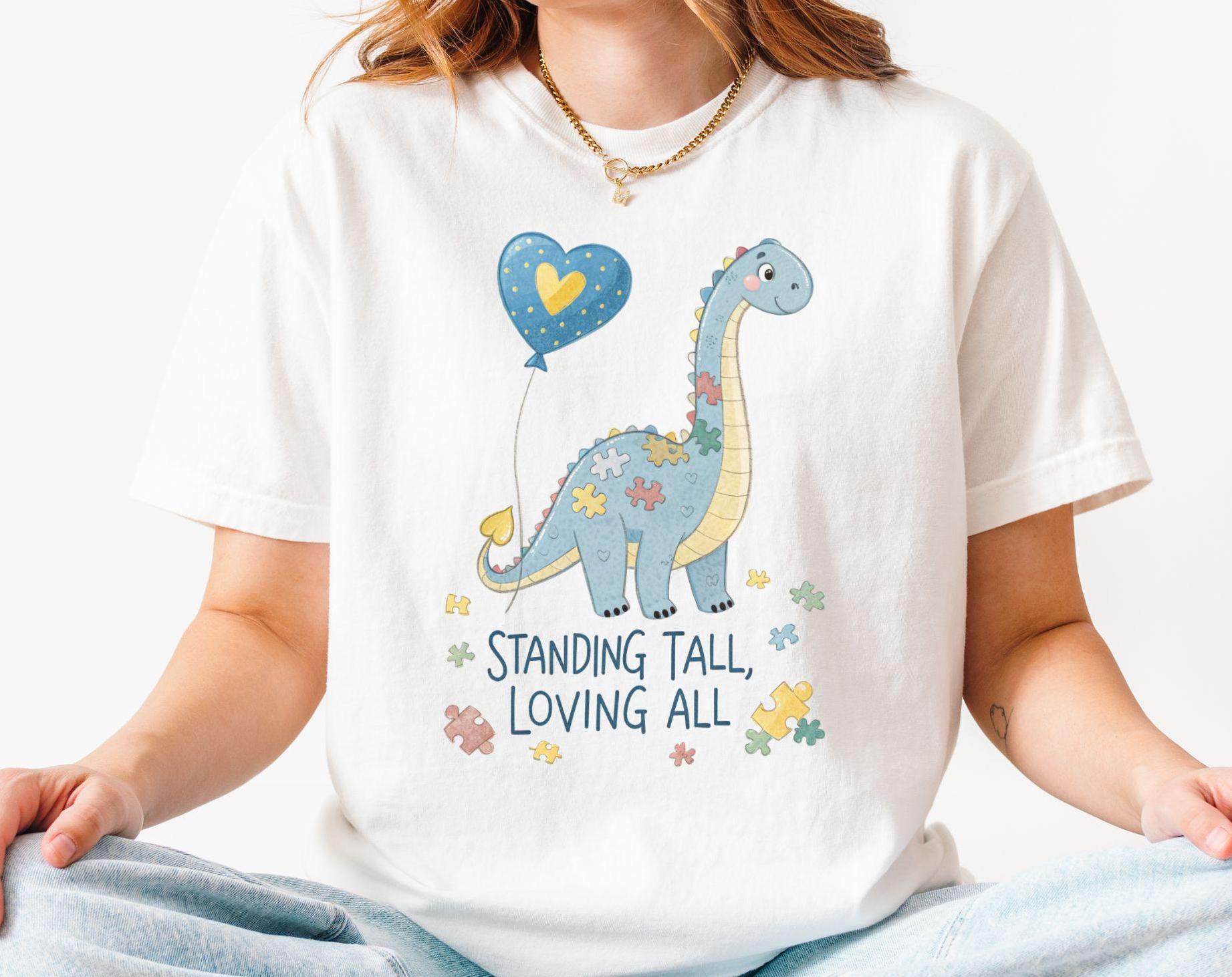Austism Awareness T Shirt Cute Dinosaur Inclusion Shirt Teacher Gift Austism Acceptance Tee Graphic Tee – Fan Favorite · High-Quality Print