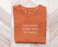 Wine and Book Lover Tee Read Books Drink Wine Be Happy Shirt Funny Reader Gift Bookish T Shirt Graphic Tee – Easygoing Wear · Perfect For Daily Wear