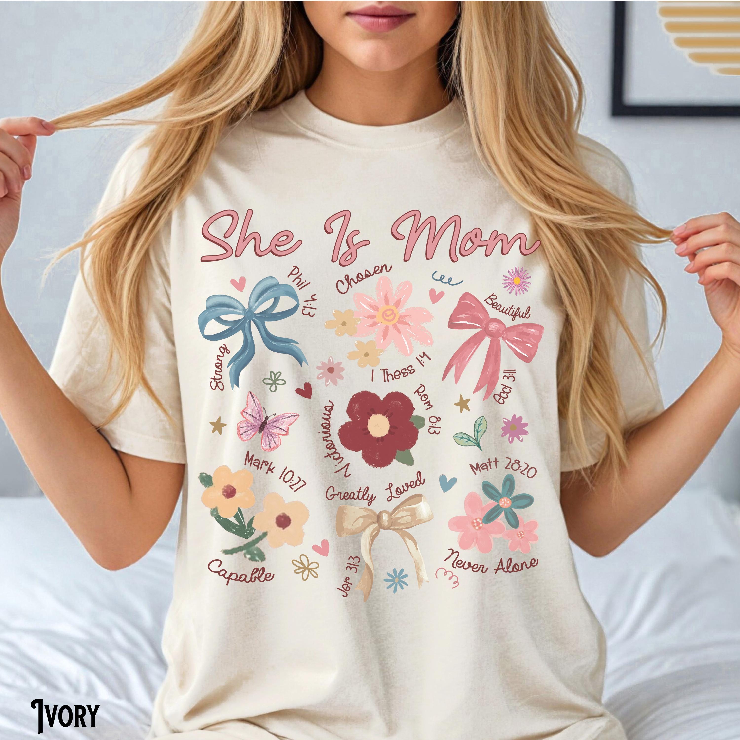 Christian Mom Shirt Flower Mom Tee Coquette She is Mom T Shirt Bible Verse Mom Faith Mother39s Day Gift Gift for Mom Graphic Tee – Easygoing Wear · High-Quality Print
