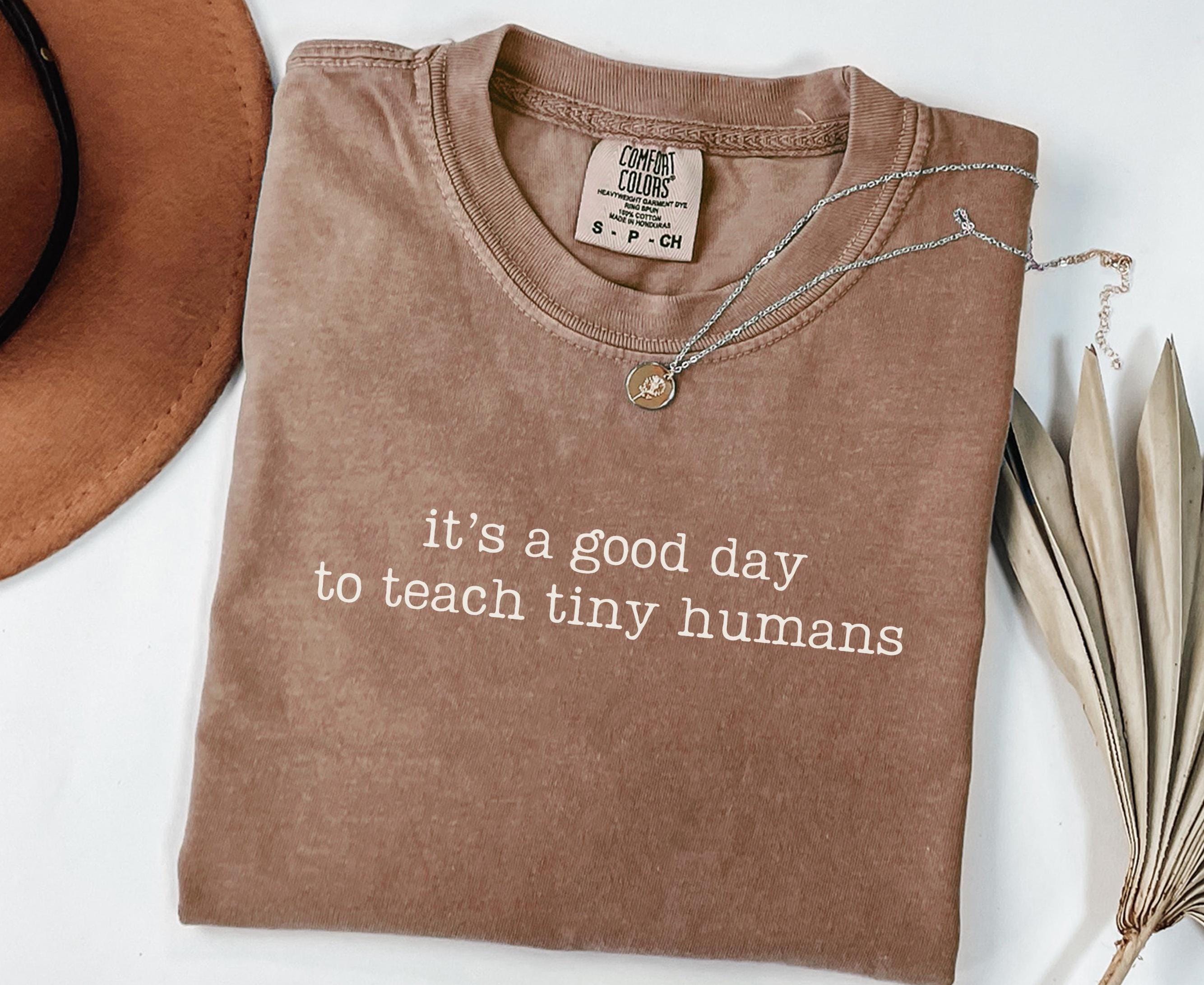 Teacher Shirt It39s a Good Day to Teach Tiny Humans Tshirt Perfect Day Care Worker or Teacher Gift Graphic Tee – Cozy Vibes · Great Gift For Fans
