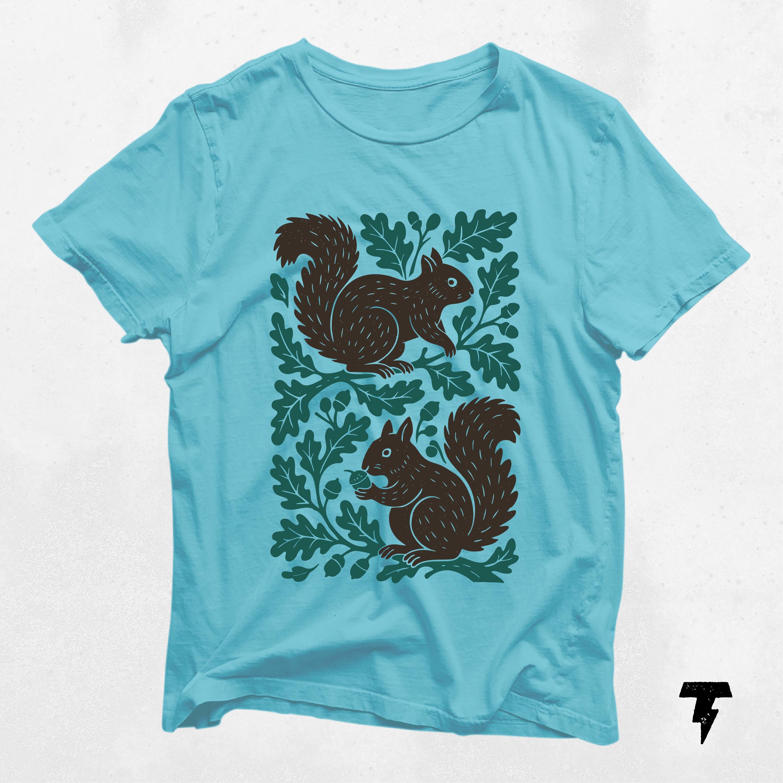 Squirrel Tee Nature Shirt with Oak Tree Design Wildlife T Shirt for Forest Lovers Casual Outdoor Animal Apparel Graphic Tee – Feel-Good Design · Trending Graphic Apparel