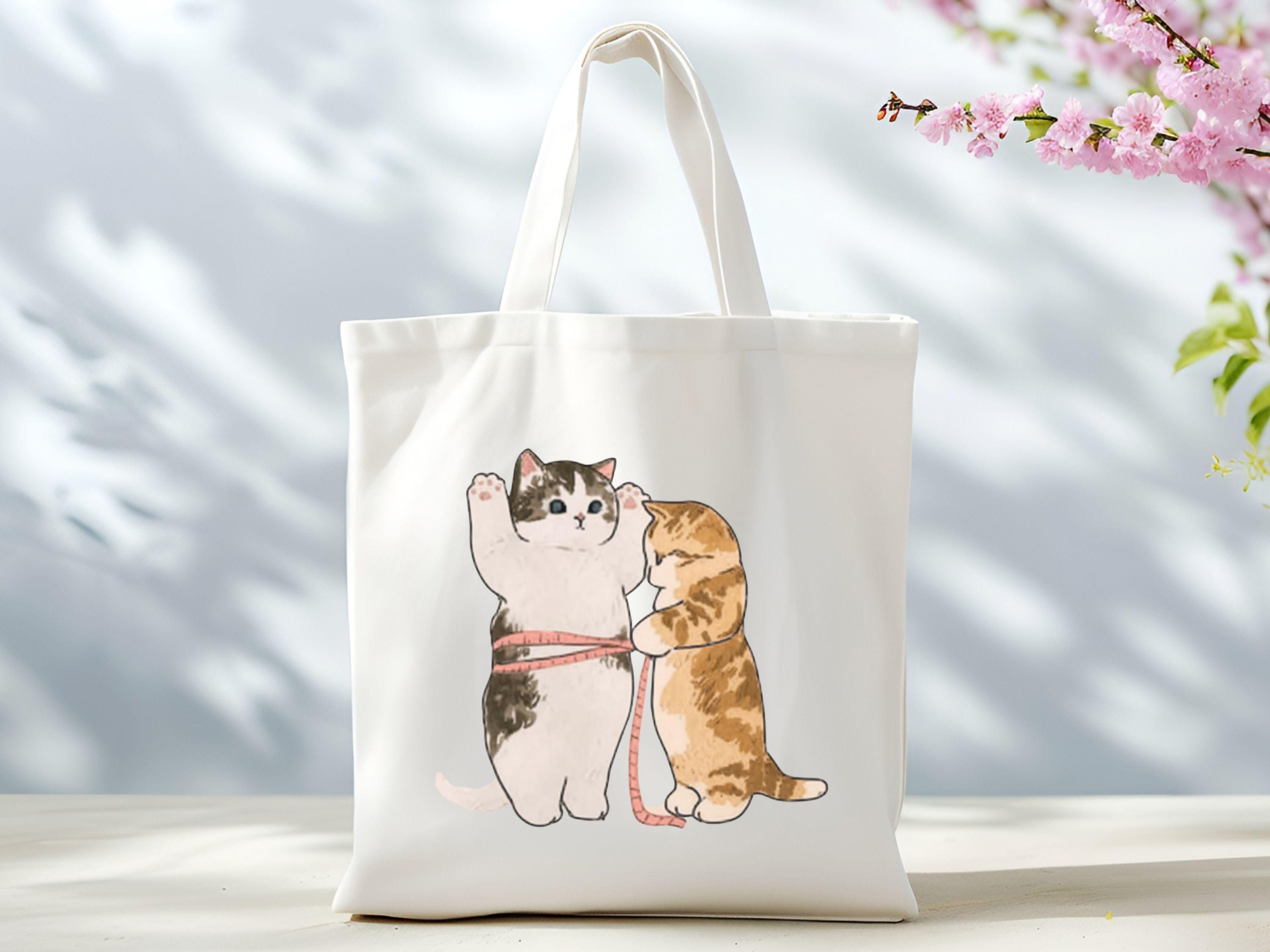 Cats Measuring Each Other Tote Cute Cat Lover Bag Cute Cat Measuring Tape Tote Bag Adorable Kitty Gift Whimsical Cat ArtFunny Cat Tote Tote Bag – Fan Favorite · Perfect For Daily Wear