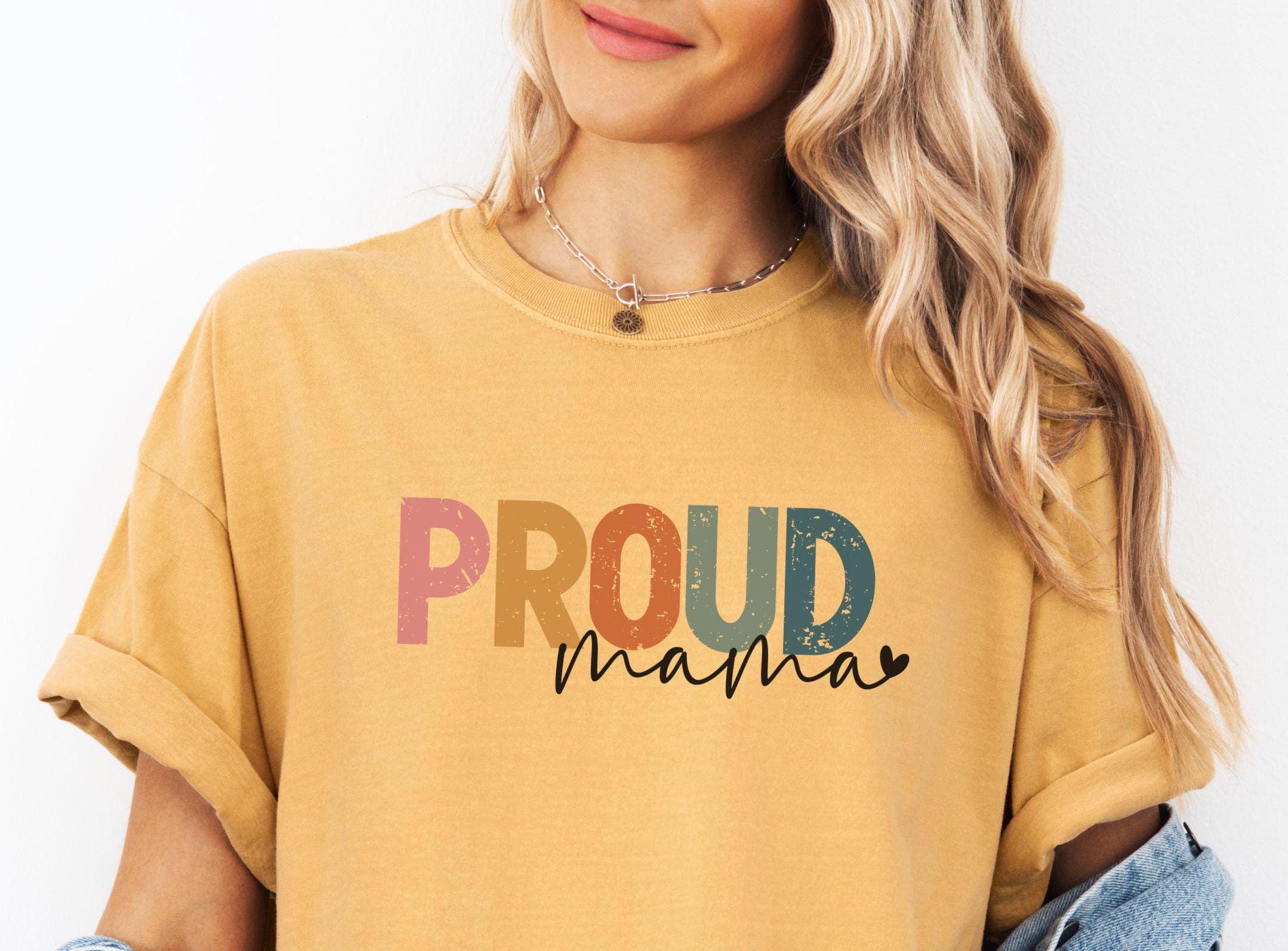 PROUD MAMA Shirt Tee for Pride Month Rainbow of Colors Mother39s Day Gift for Mom Graphic Tee – Fan Favorite · High-Quality Print