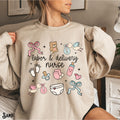 Labor and Delivery Nurse Sweatshirt L and D Nurse Sweater LD Nurse Whimsical Doodle Art Sweatshirt Fleece RN OB Graduation Gift Sweatshirt – Premium Graphic · Great Gift For Fans