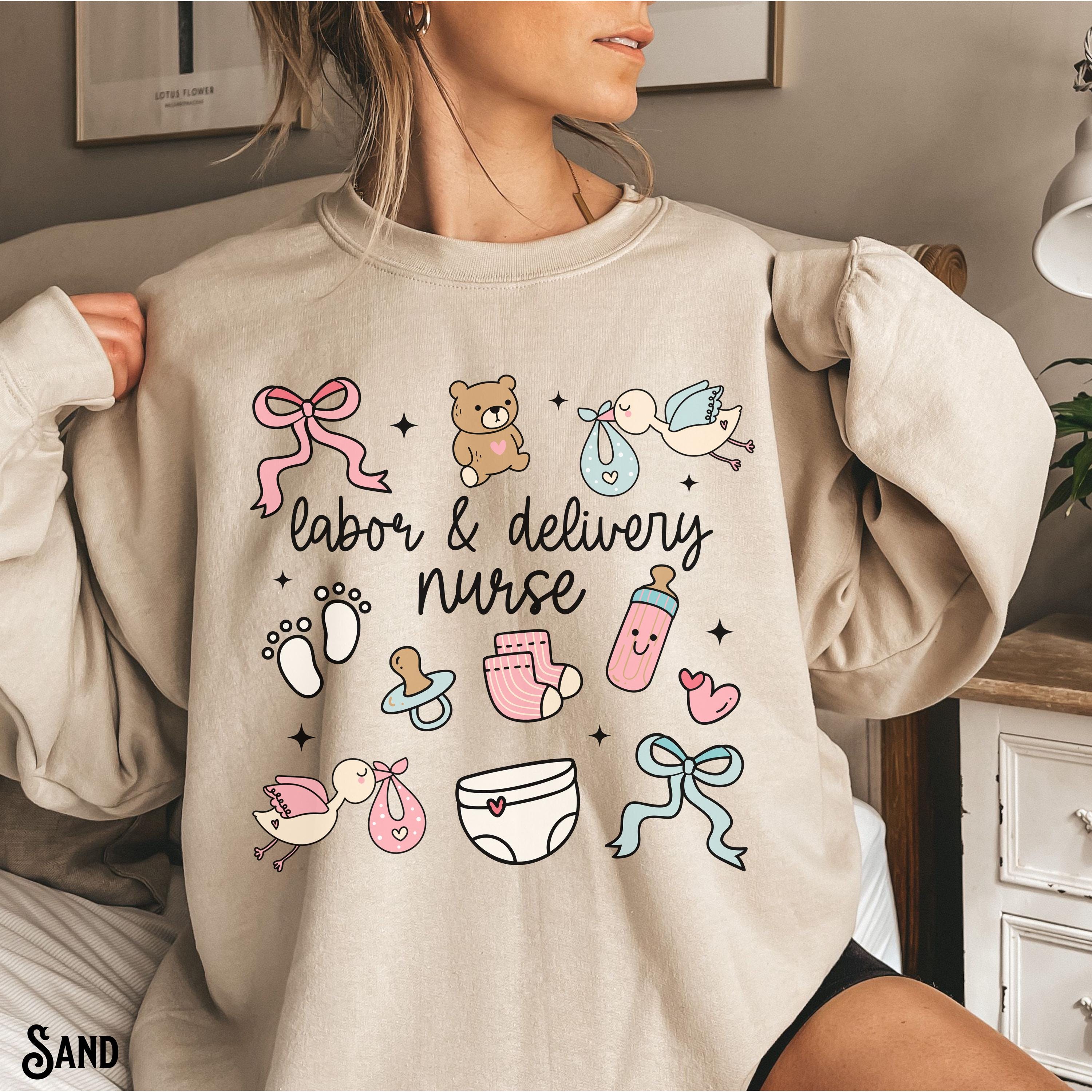 Labor and Delivery Nurse Sweatshirt L and D Nurse Sweater LD Nurse Whimsical Doodle Art Sweatshirt Fleece RN OB Graduation Gift Sweatshirt – Premium Graphic · Great Gift For Fans