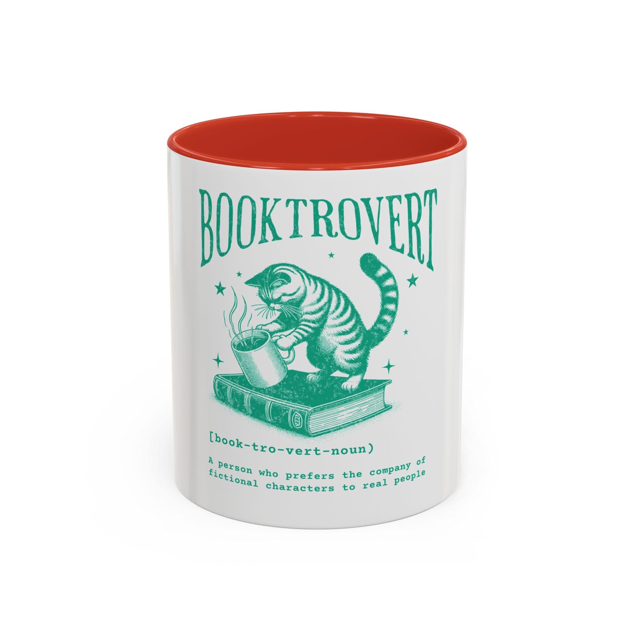 Booktrovert Coffee Mug Cozy Mug for Book Lovers Gift for Readers Literary Humor Cat Lover Gift Black Accent Mug Graphic Tee – Feel-Good Design · High-Quality Print