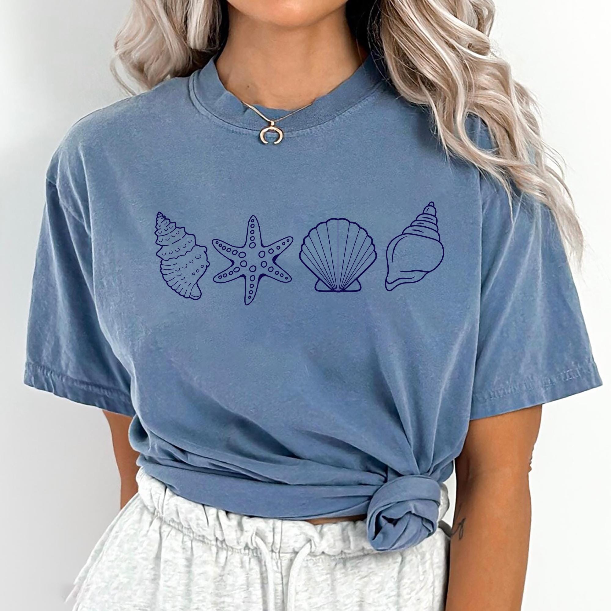 Seashell Shirt Aesthetic Beach T shirt Ocean Lover Summer Coastal Shirt Boho Sea Life Shirt Cute Beach Vacation Tee for Women Graphic Tee – Premium Graphic · High-Quality Print
