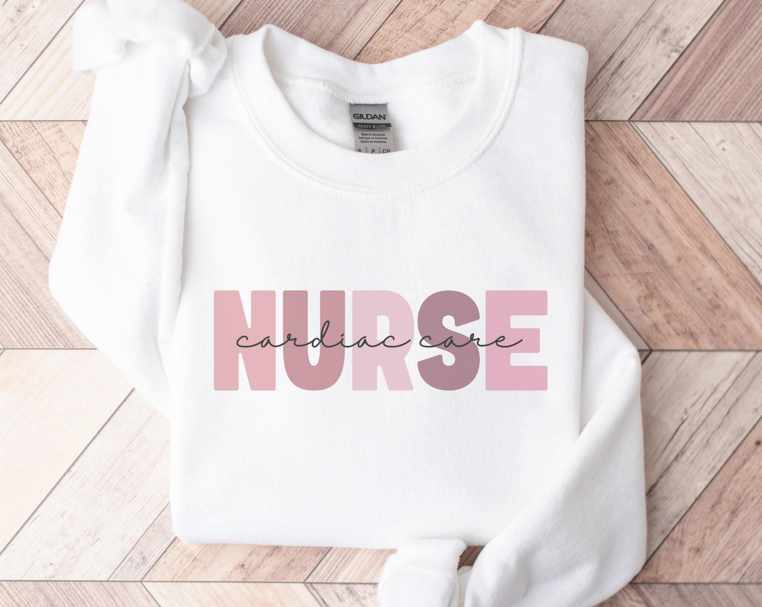 Nurse Sweatshirt Cardiac Care Nurse Shirt Nurse Appreciation Week GIft RN Gift New Nurse Graduation Gift Idea Sweatshirt – Warm & Stylish · Top Pick For Any Outfit