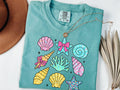 Floral Summer Shirt Wildflower Seashell Clam Summer Cute Seashell Shirt Summer Vibes Tee Beach Vibes Woman Summer Shirt Graphic Tee – Soft Feel · Top Pick For Any Outfit